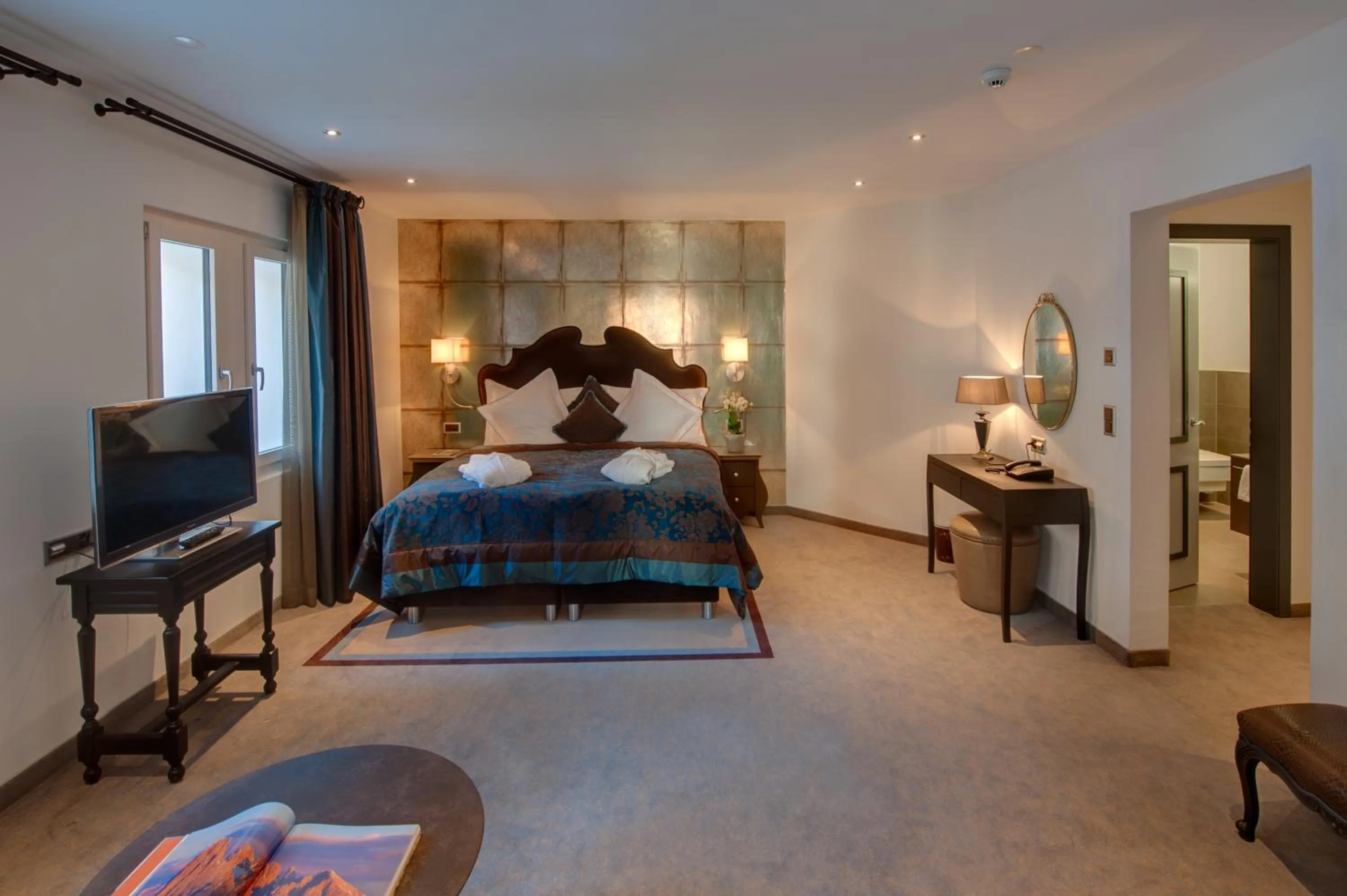 Bedroom in SchlossHotel Zermatt Active & CBD Spa Hotel