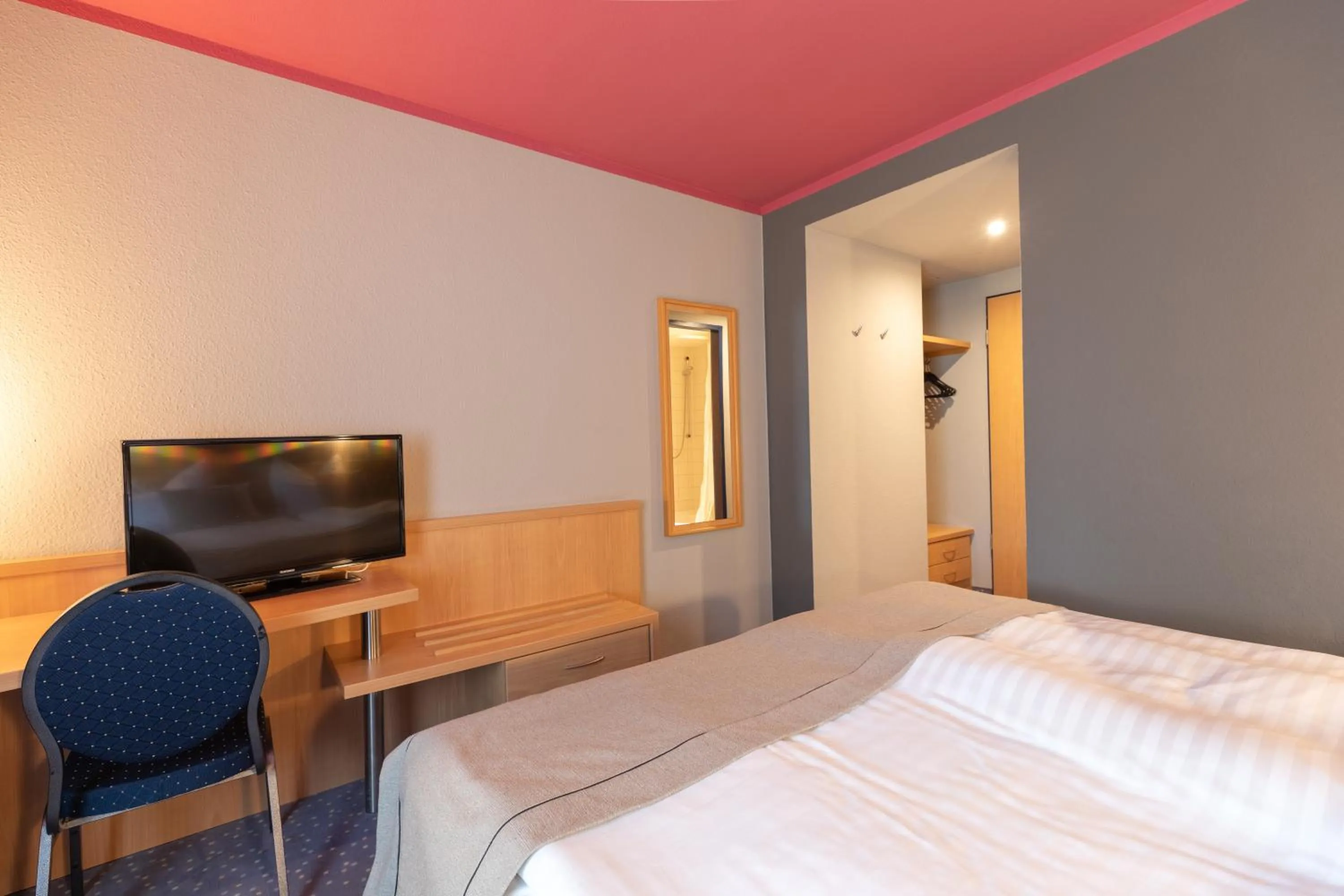 Bed in Novum Hotel Seegraben Cottbus