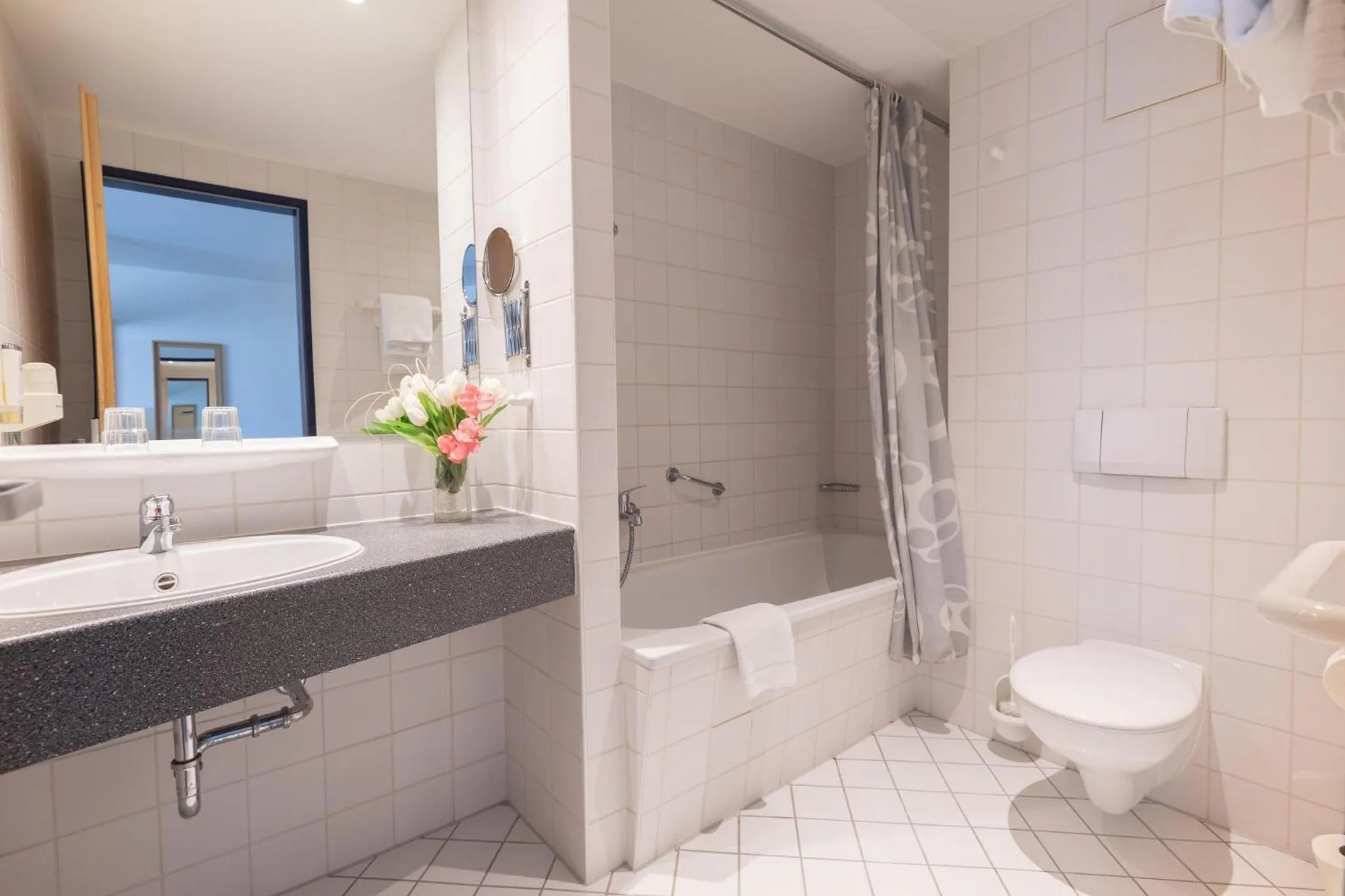 Bathroom in Garner Hotel Cottbus Süd by IHG