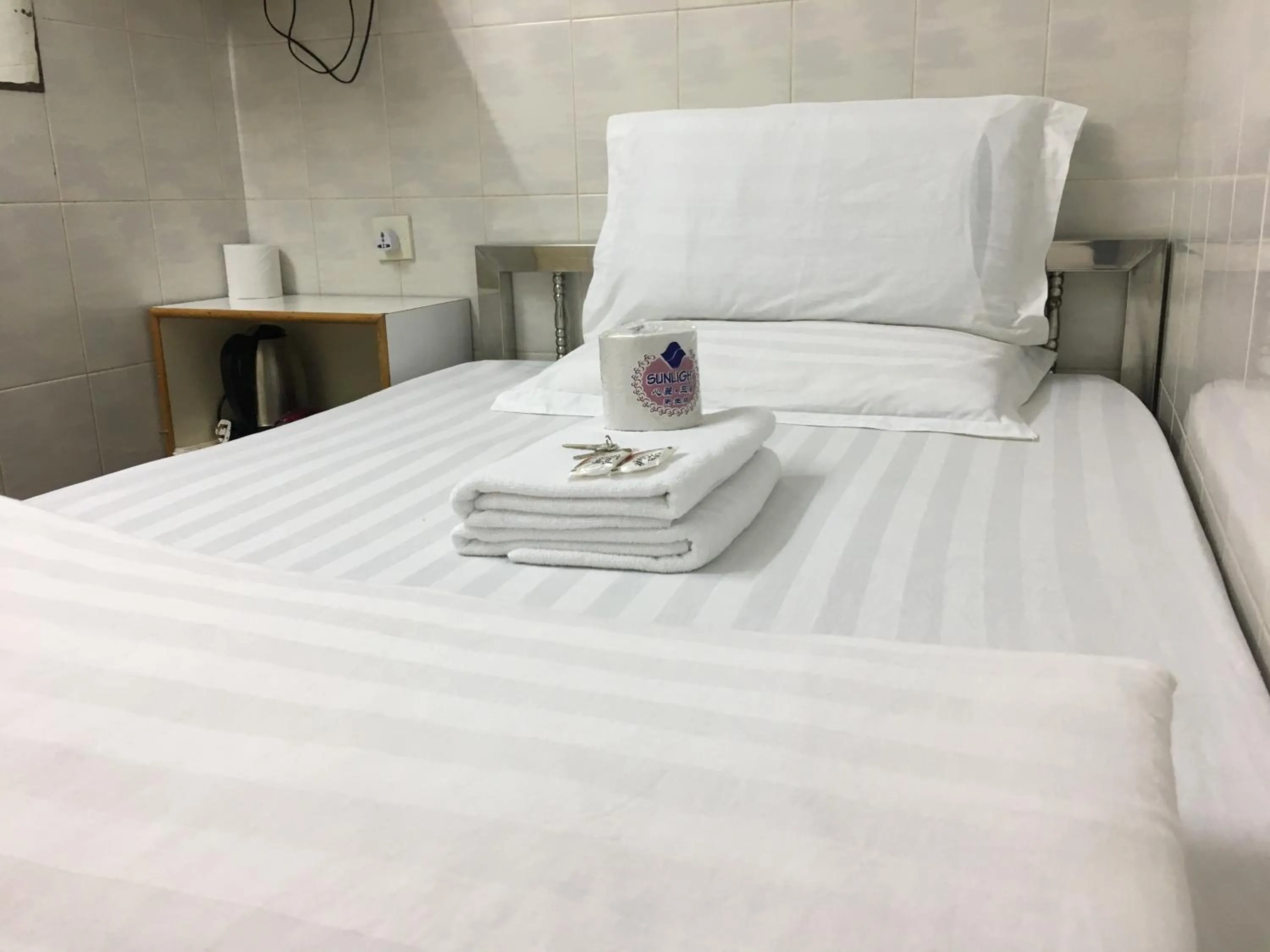 Bed in New Yan Yan Guest House reception 9th floor Flat E4 E6