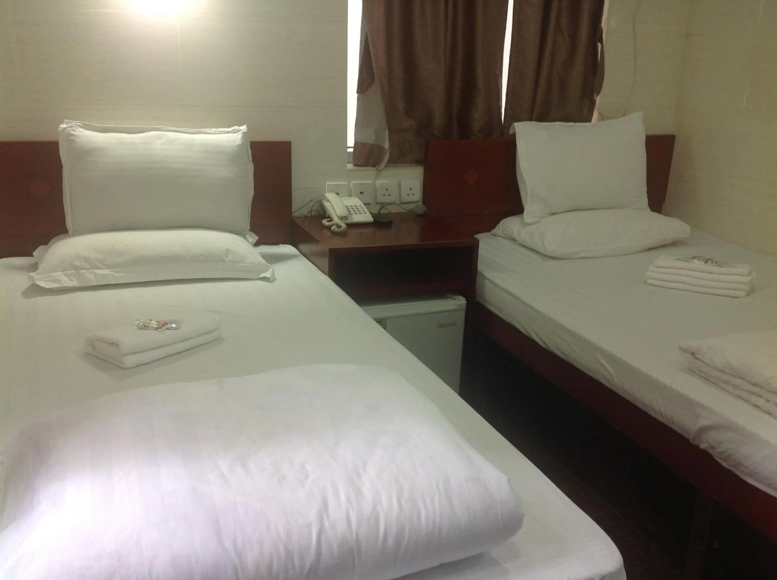 Bed in New Yan Yan Guest House reception 9th floor Flat E4 E6