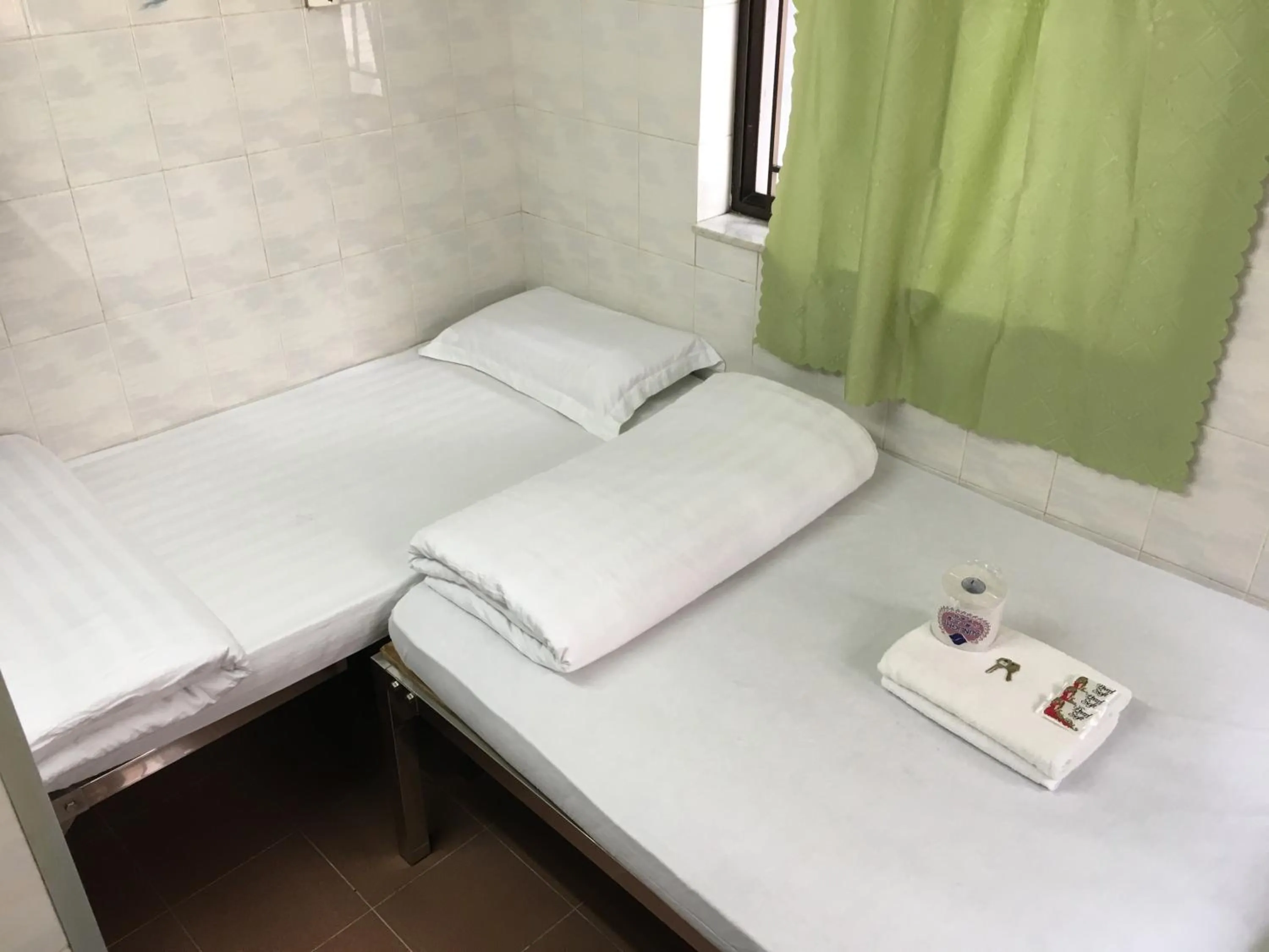 Bed in New Yan Yan Guest House reception 9th floor Flat E4 E6