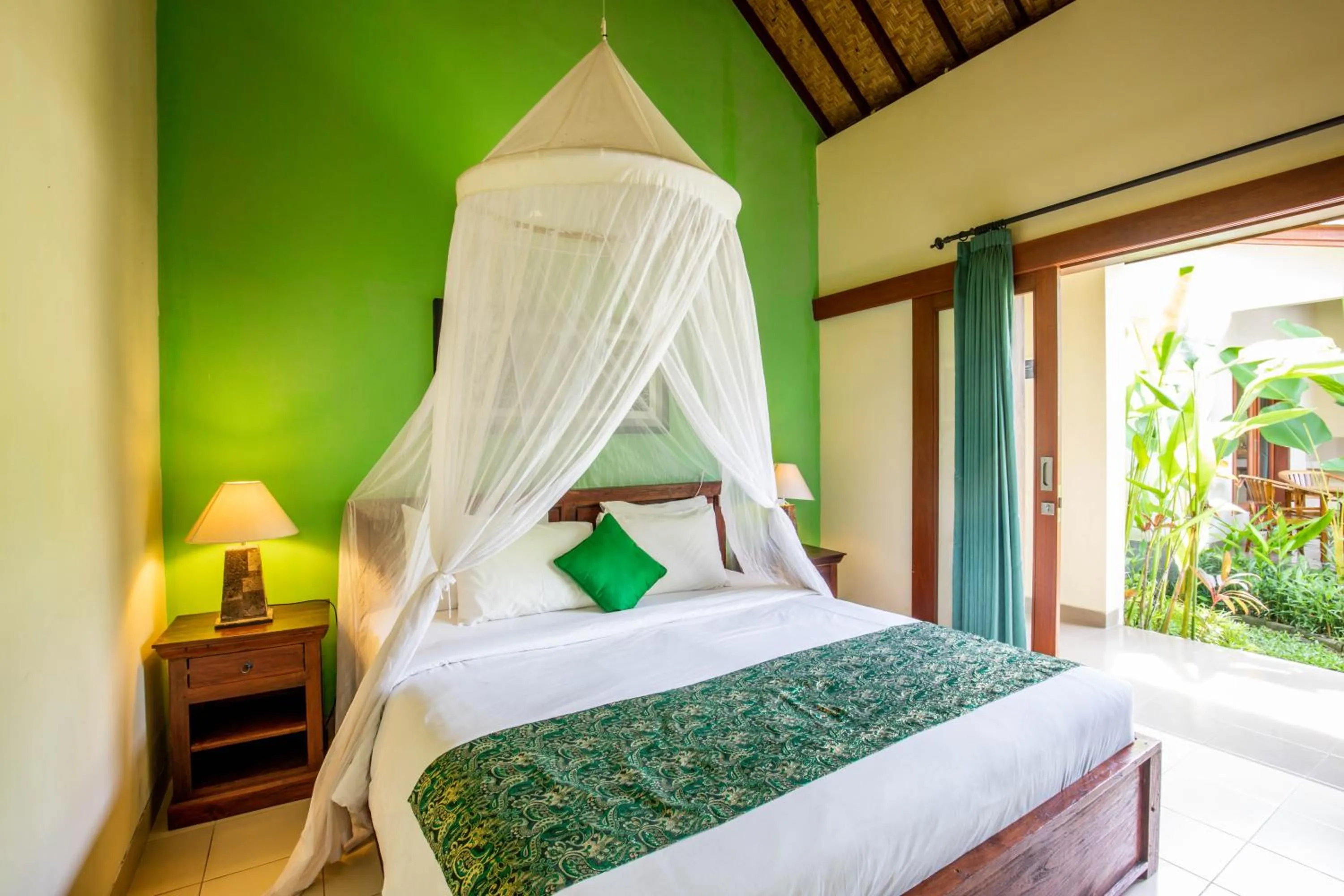 Bed in Sisin Ubud View