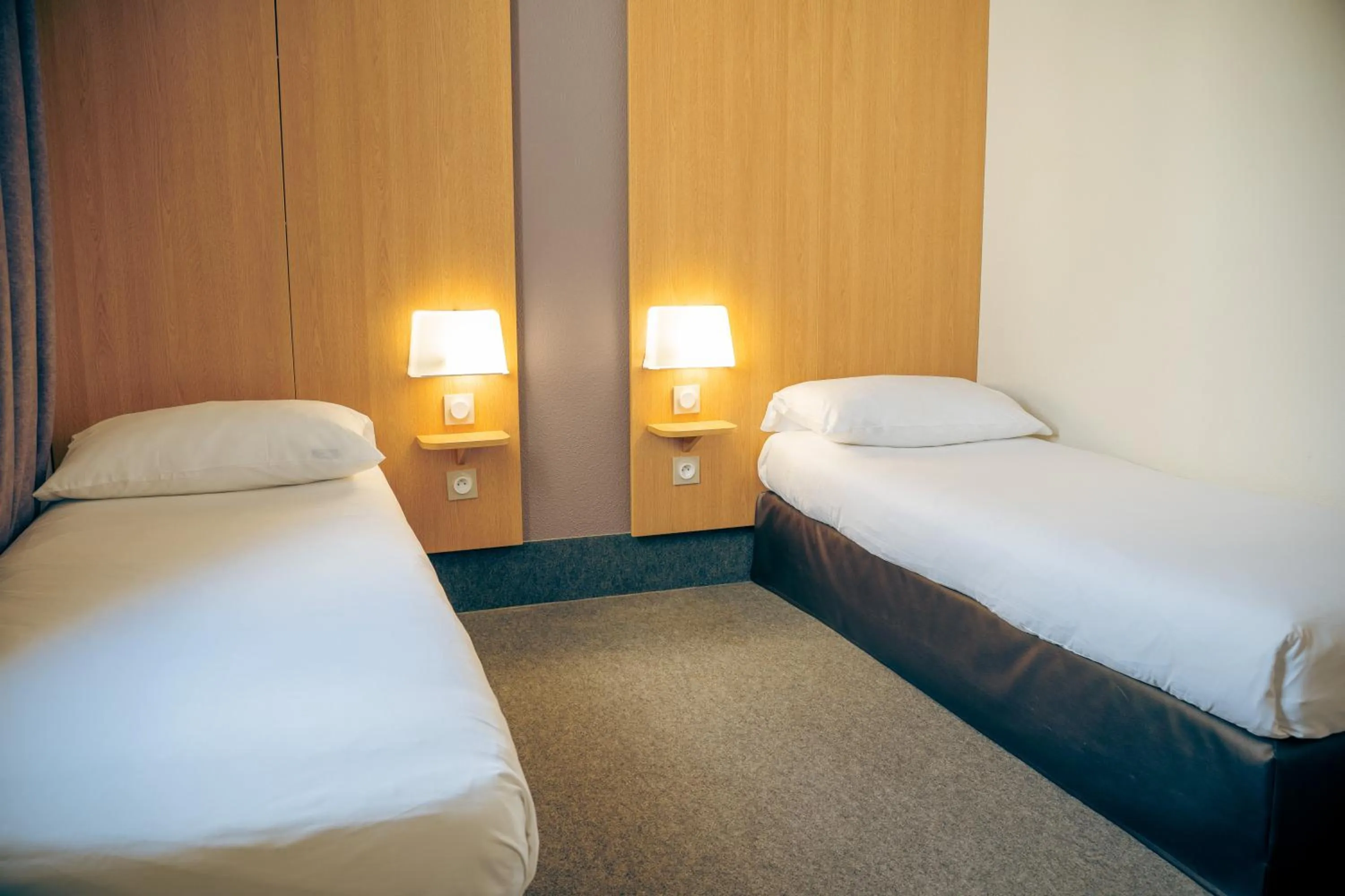 Bed in B&B HOTEL Metz Est Technopole Pôle Santé