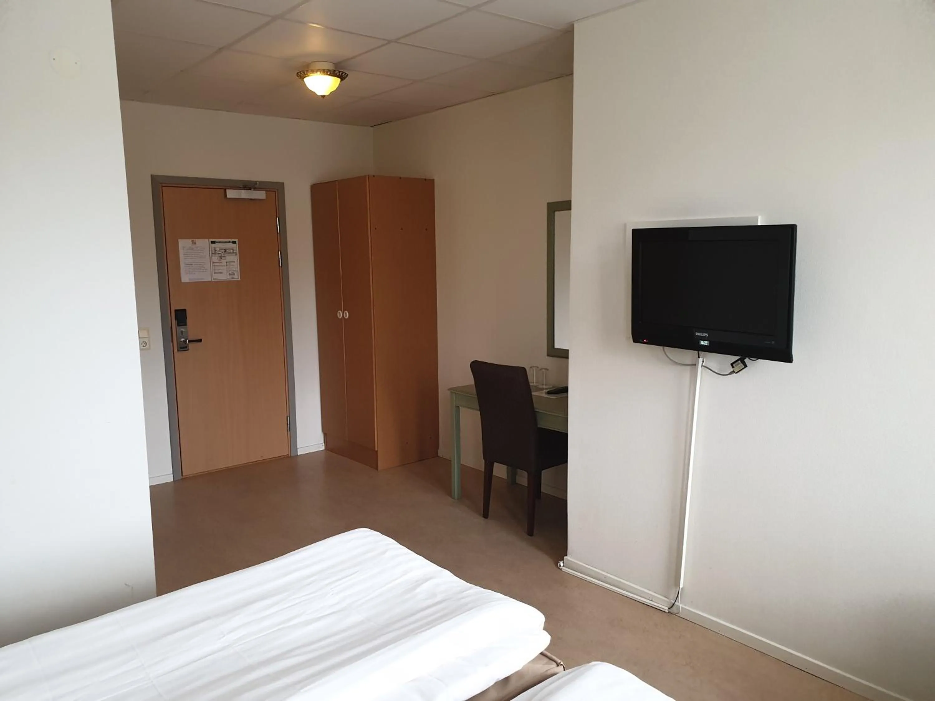 TV and multimedia, Bed in Hotel Expo Stockholm