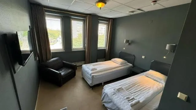 Photo of the whole room, Bed in Hotel Expo Stockholm