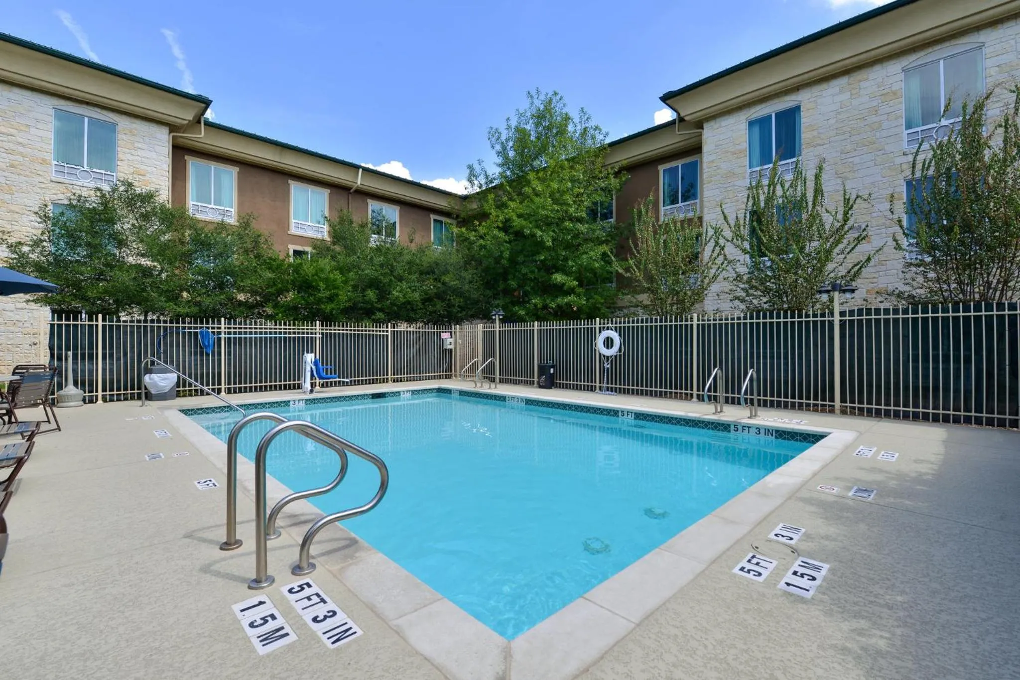 Swimming pool in Holiday Inn Express & Suites Austin SW - Sunset Valley by IHG Hotel
