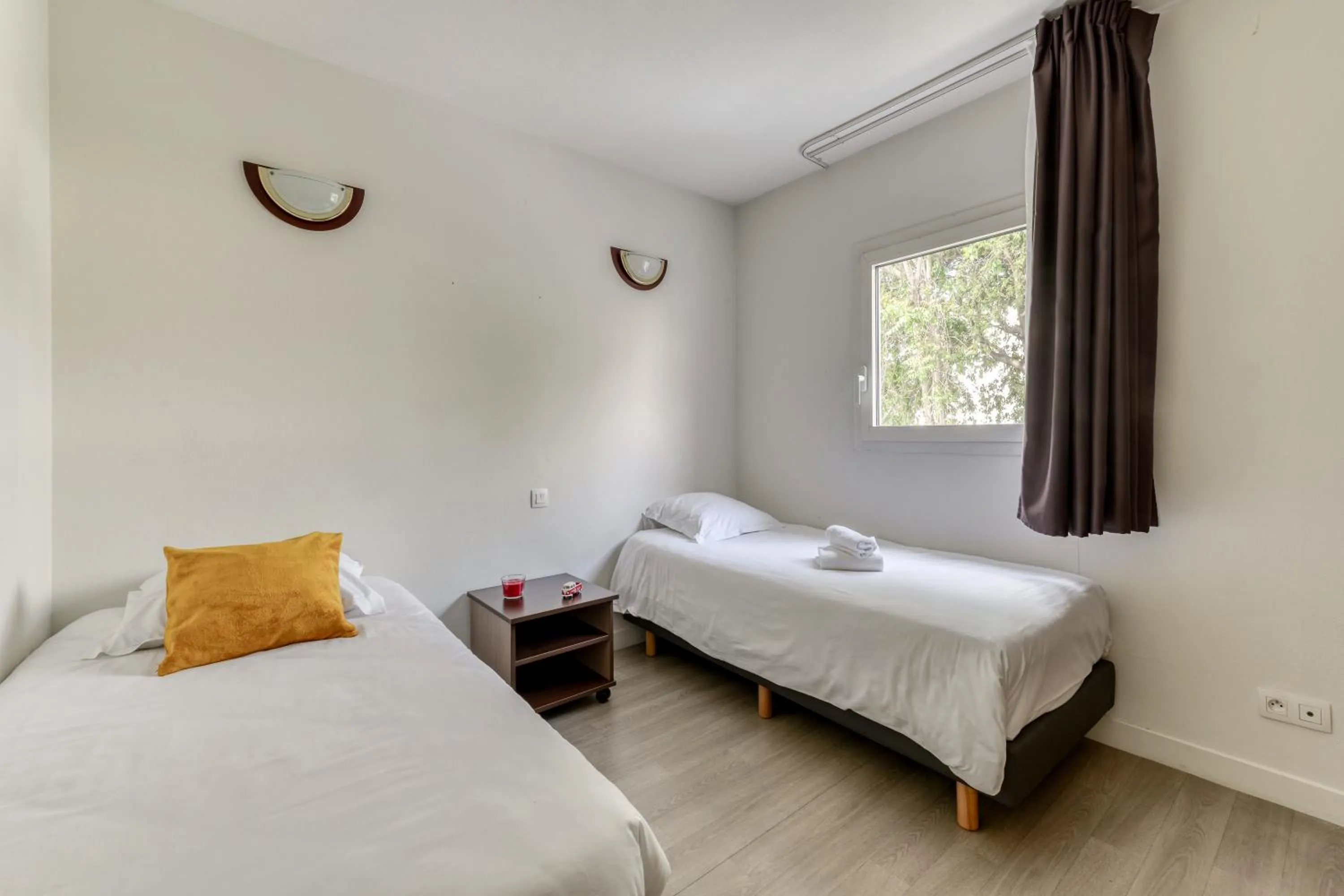 Bed in Zenitude Hôtel-Résidences Béziers Centre