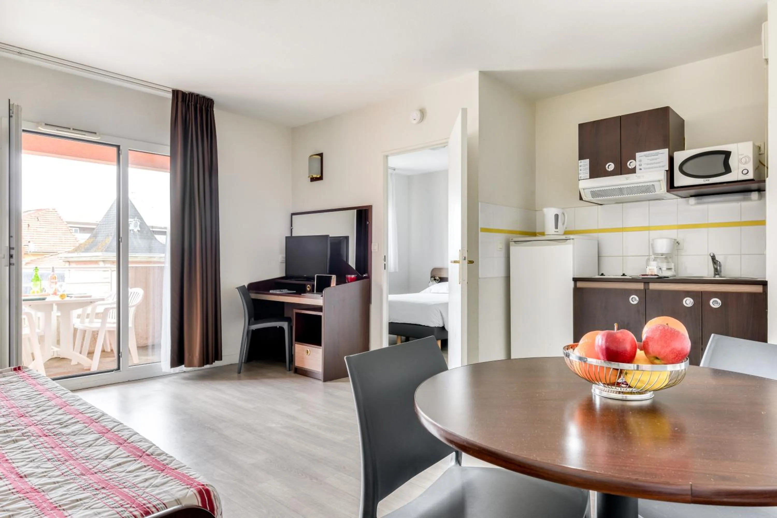 Living room in Zenitude Hôtel-Résidences Béziers Centre