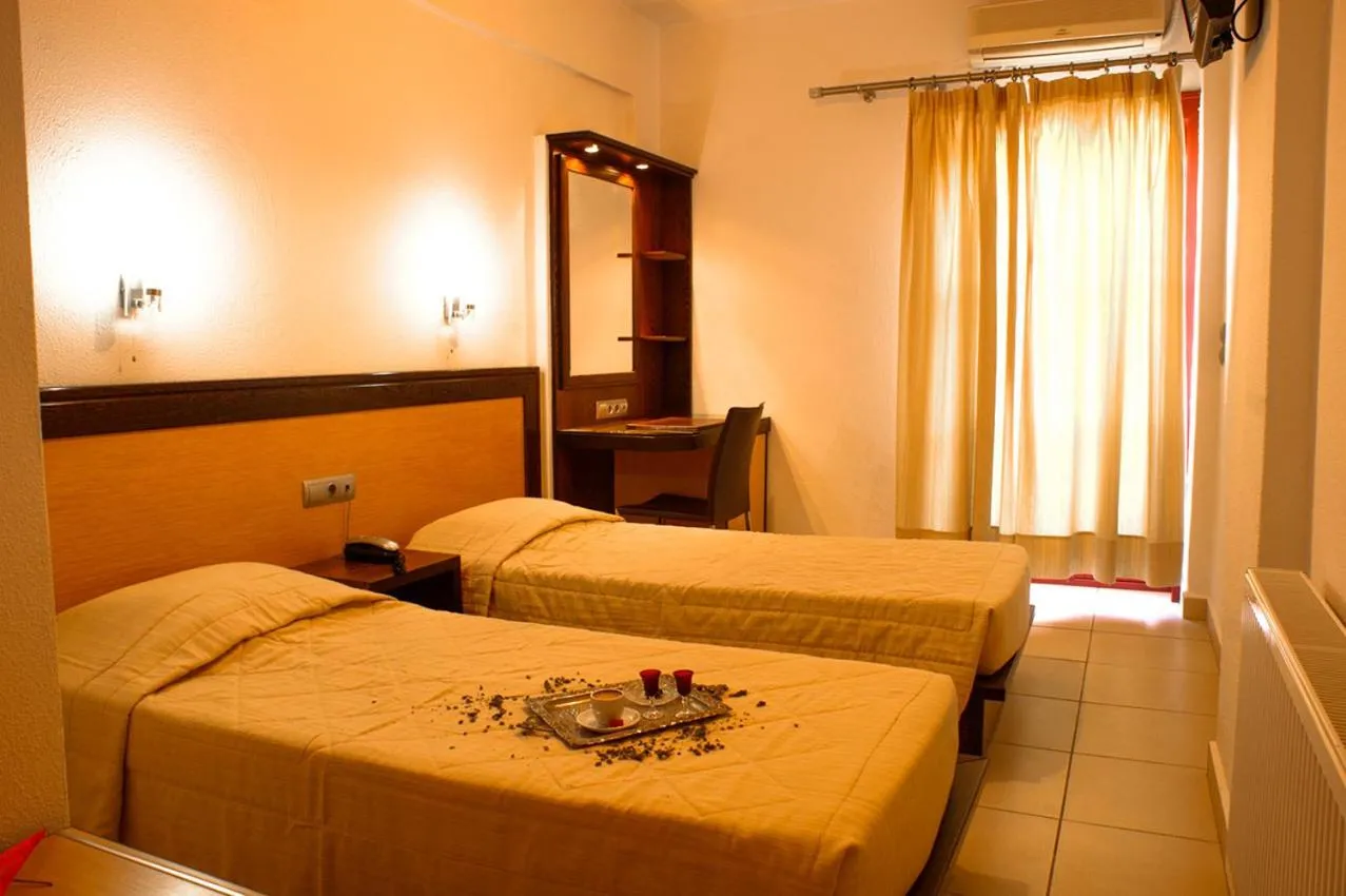 Bed in Aposperides Hotel