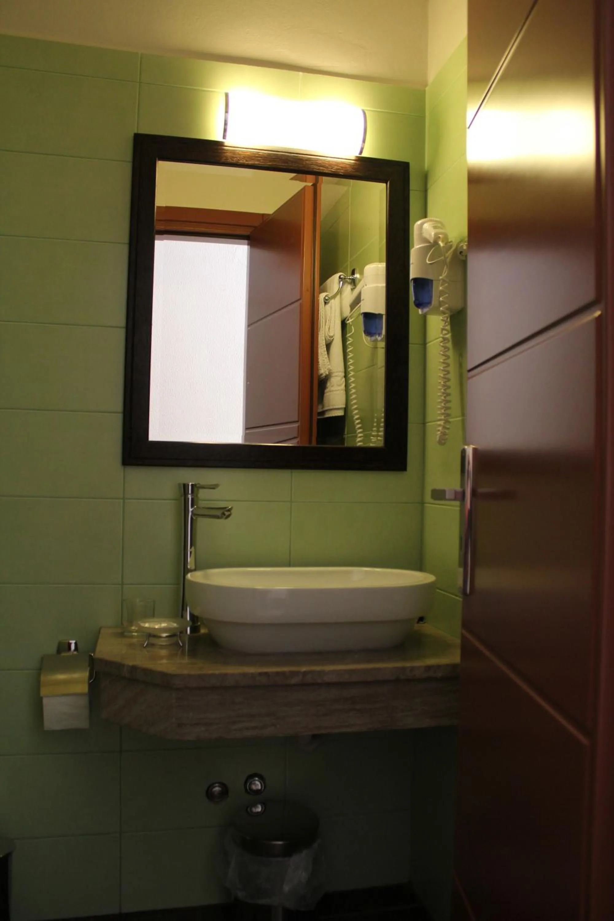 Toilet in Aposperides Hotel