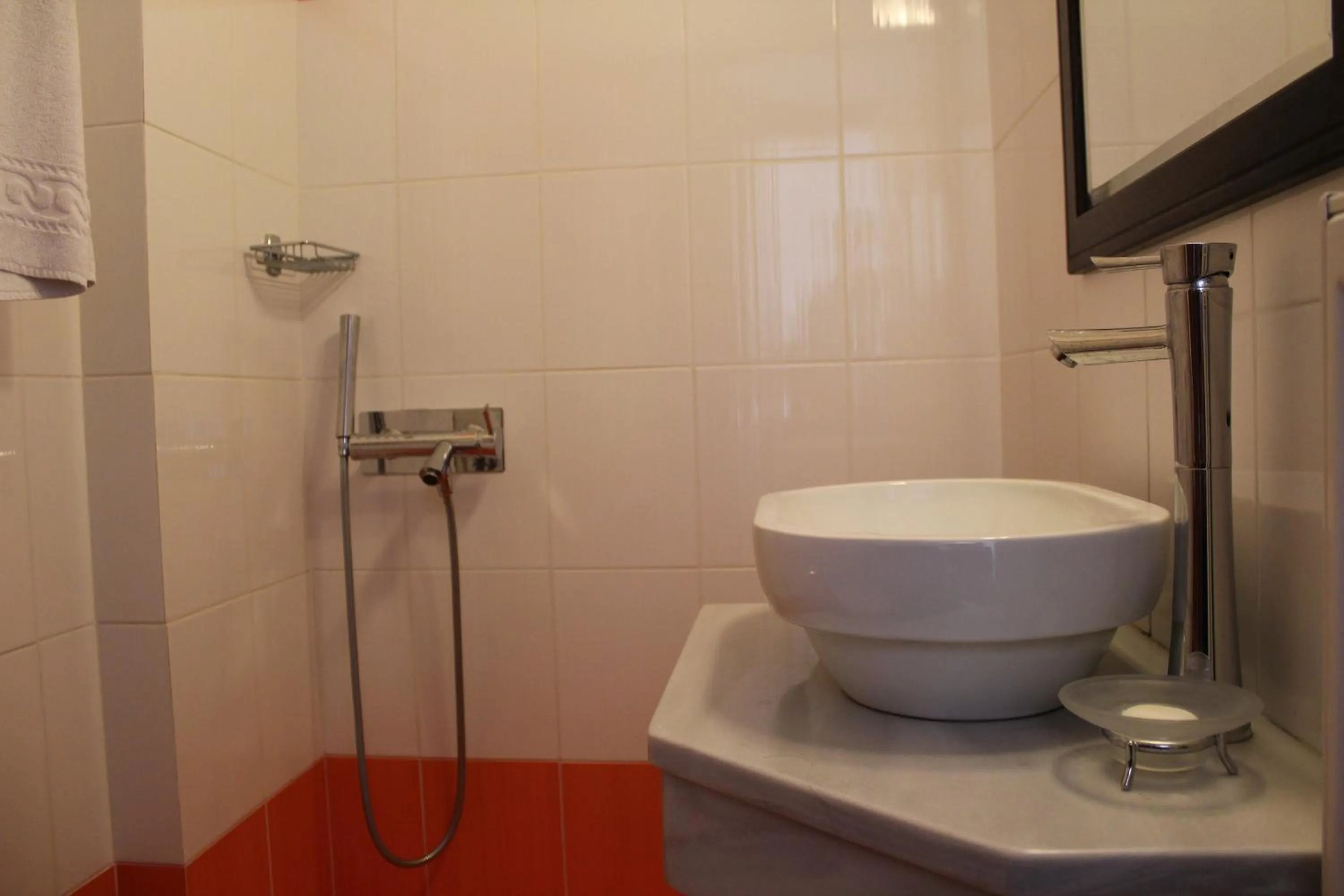 Bathroom in Aposperides Hotel