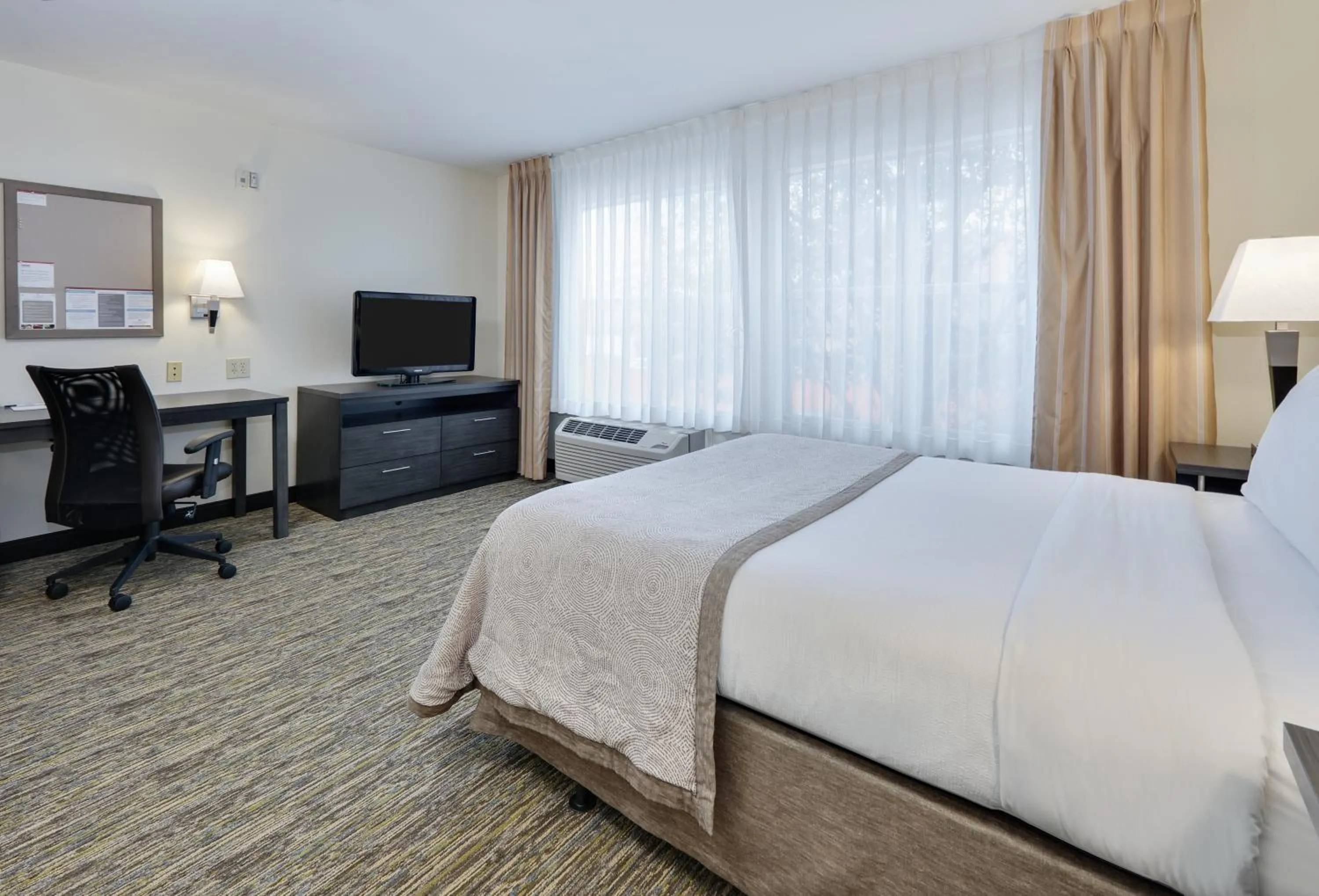 Bed in Candlewood Suites Dallas Market Center-Love Field by IHG