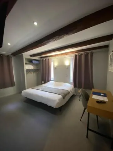 Bed in Hotel La Basilique