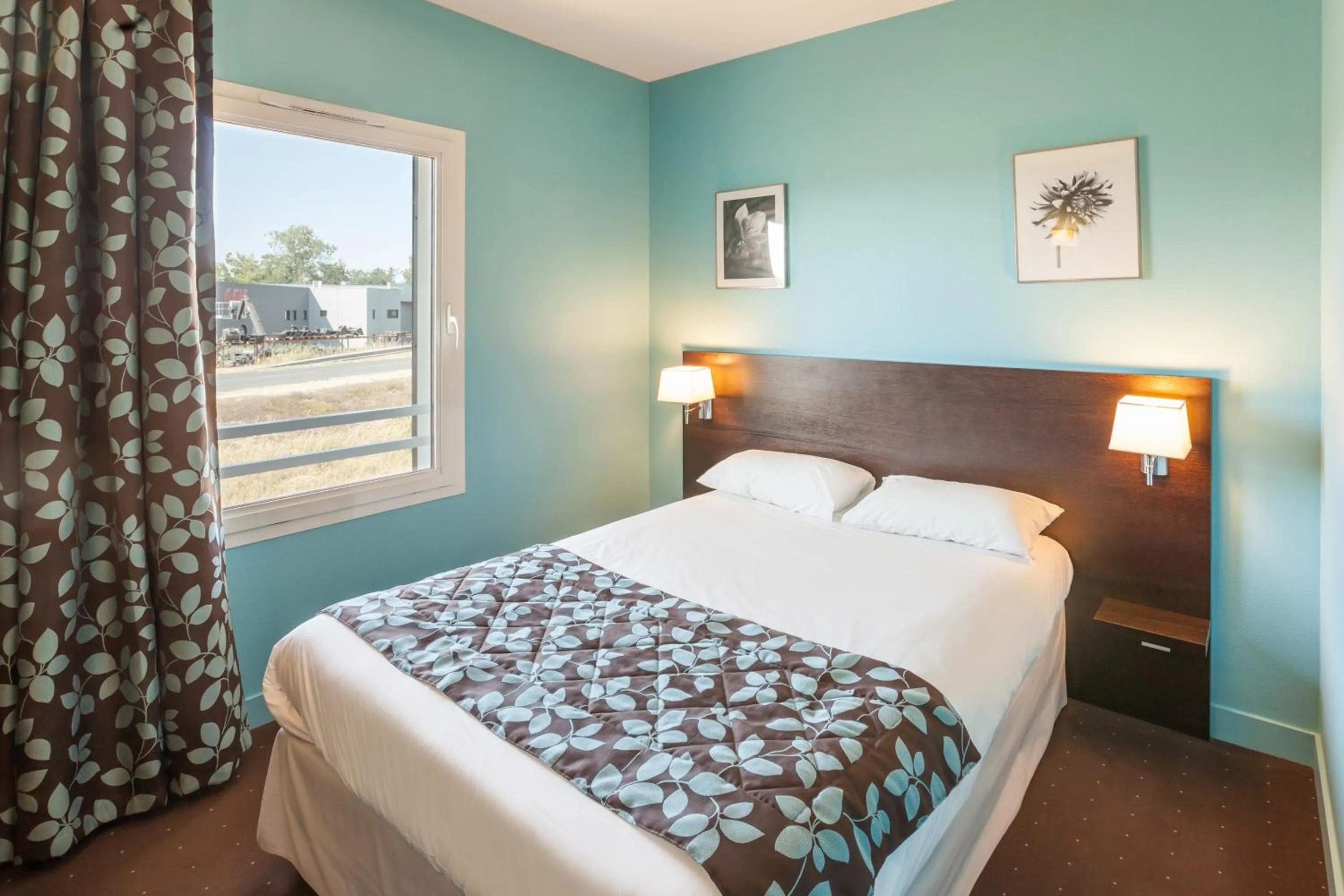 Bed in Hotel Alienor