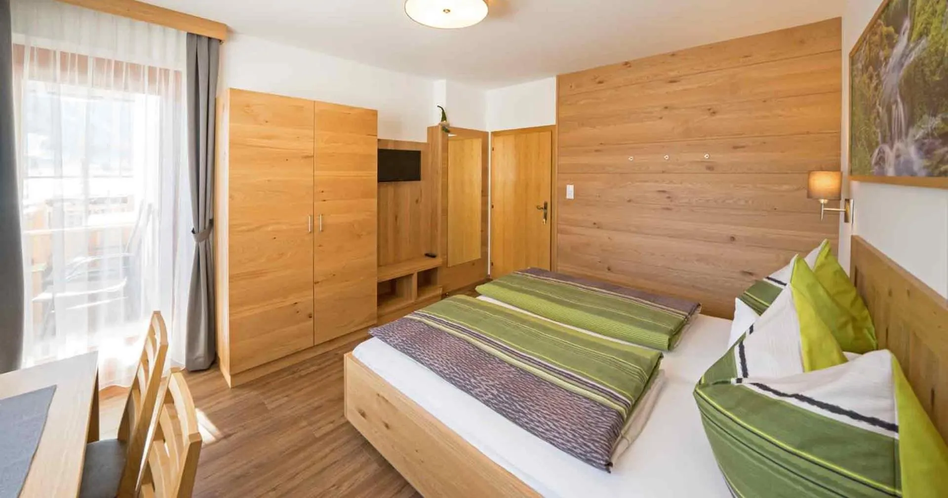 Bed in Haus Lackner am Weissensee in Kärnten