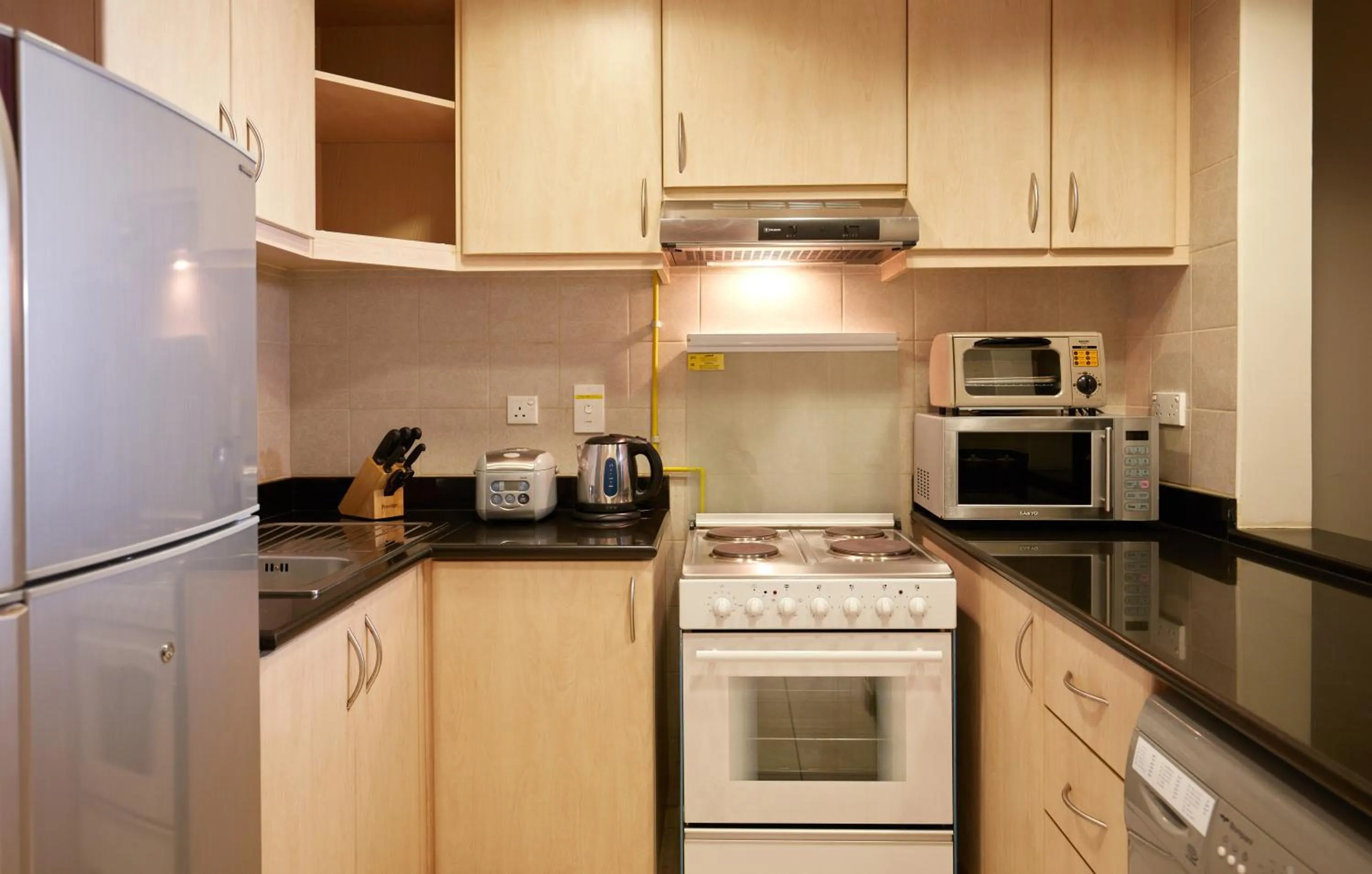 Kitchen or kitchenette in ZiQoo Hotel Apartments Dubai