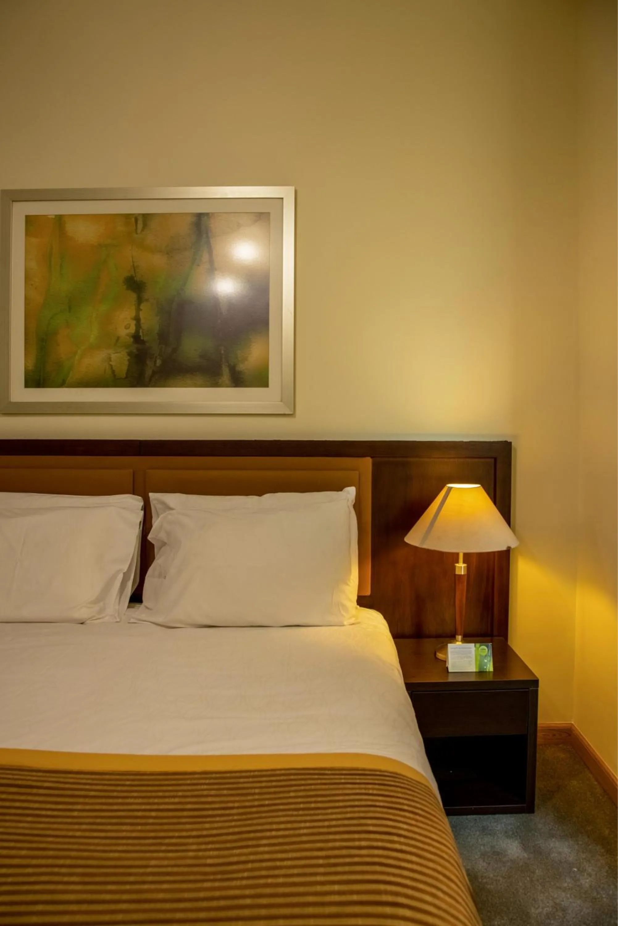 Bed in TIME Ruby Hotel Apartment