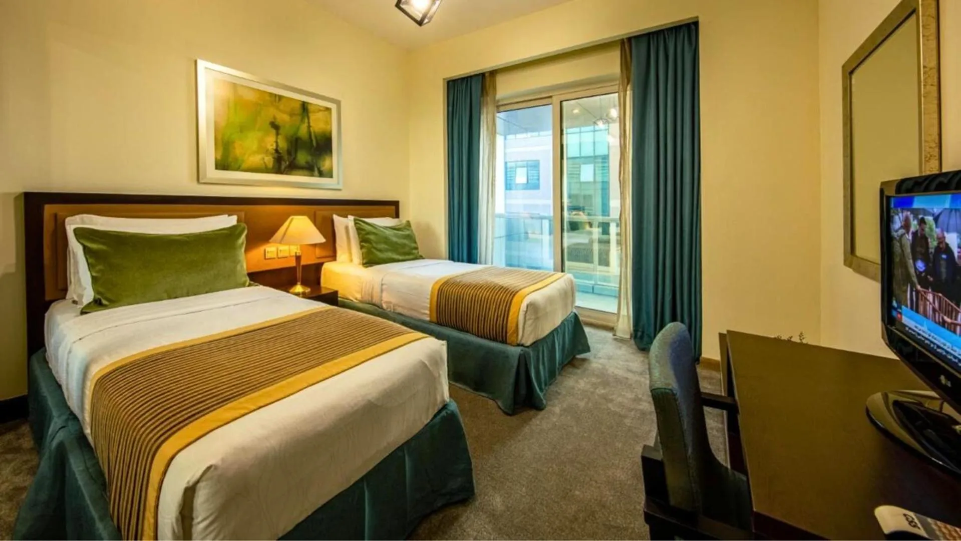 Bed in TIME Ruby Hotel Apartment