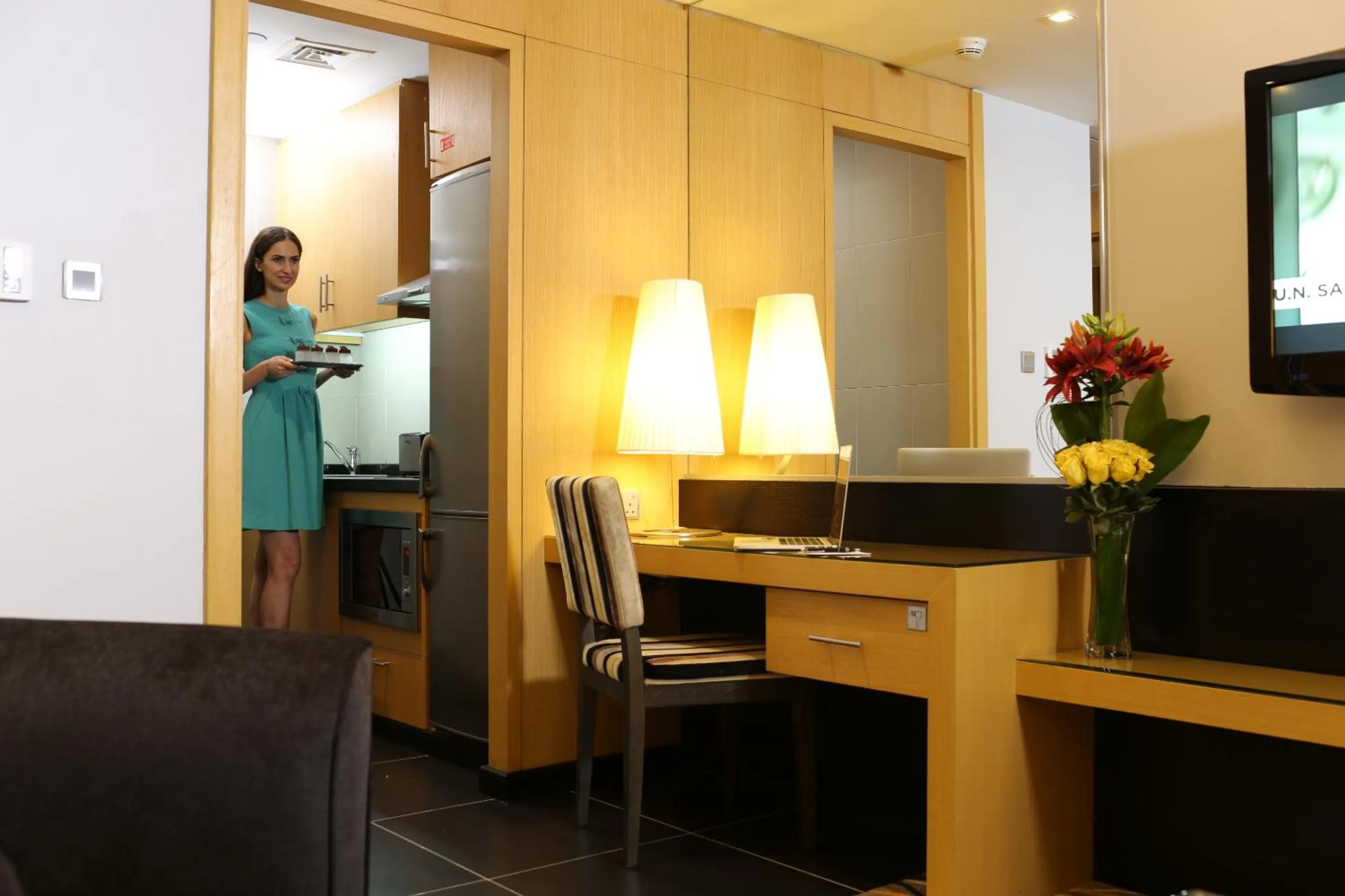 Kitchen or kitchenette in Hala Arjaan by Rotana, Deluxe Hotel Apartments