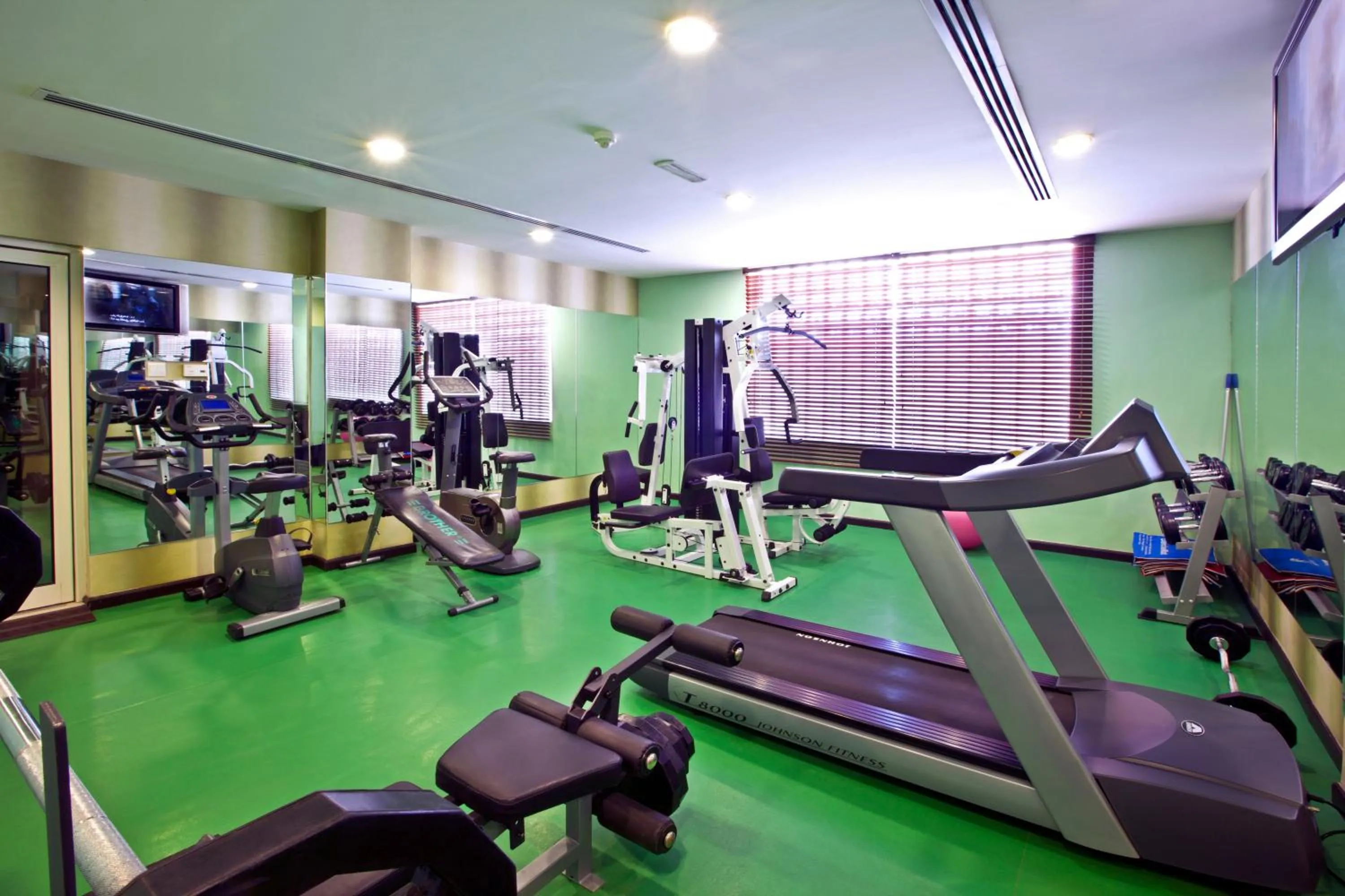 Fitness centre/facilities in Landmark Riqqa Hotel
