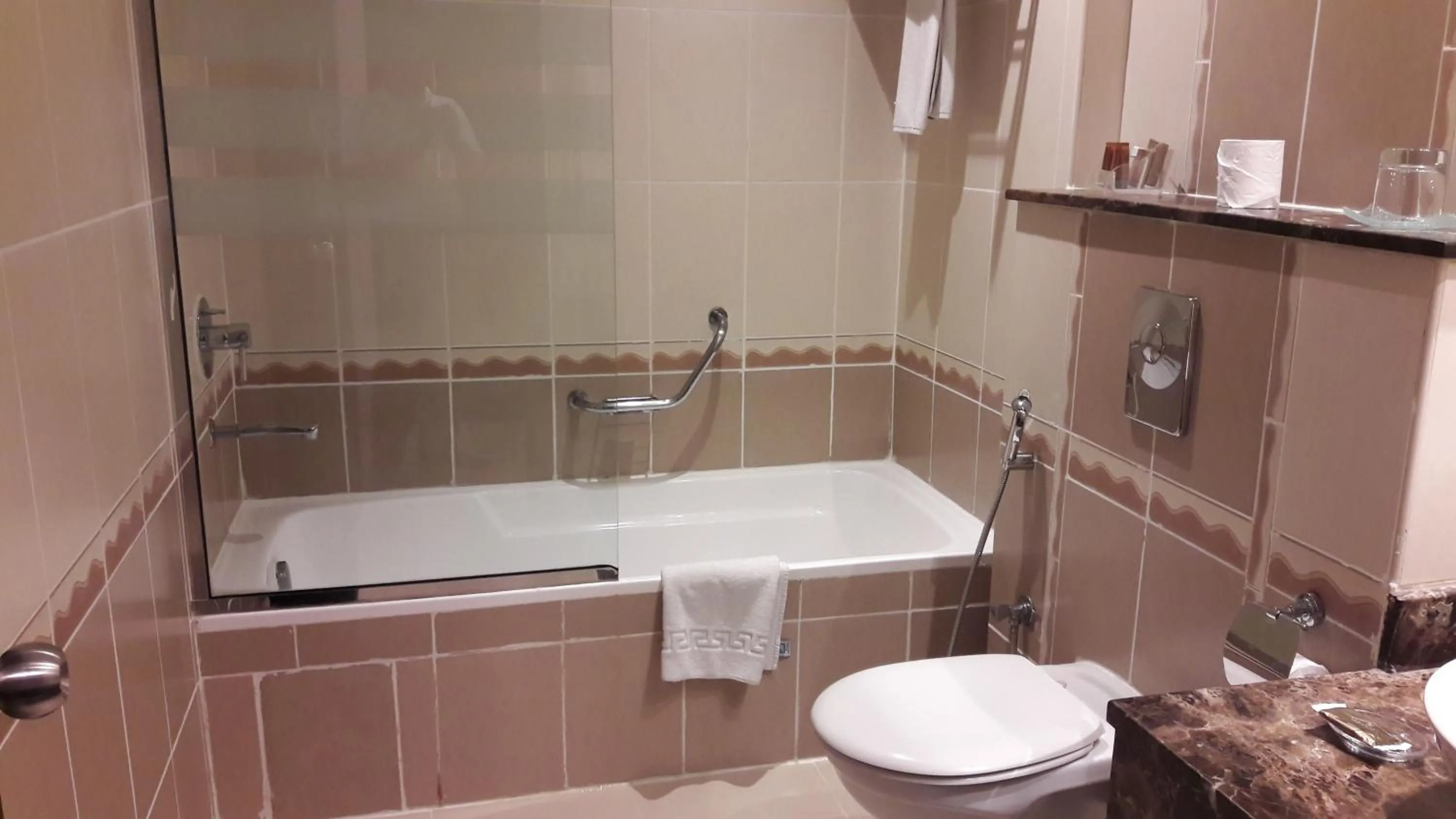 Bathroom in Landmark Riqqa Hotel