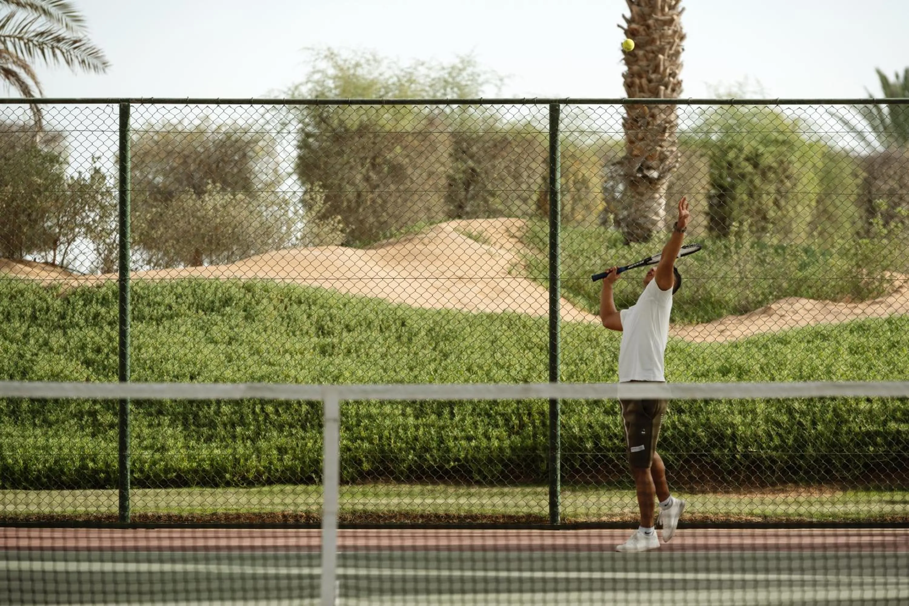 Tennis court in Anantara Qasr al Sarab Desert Resort