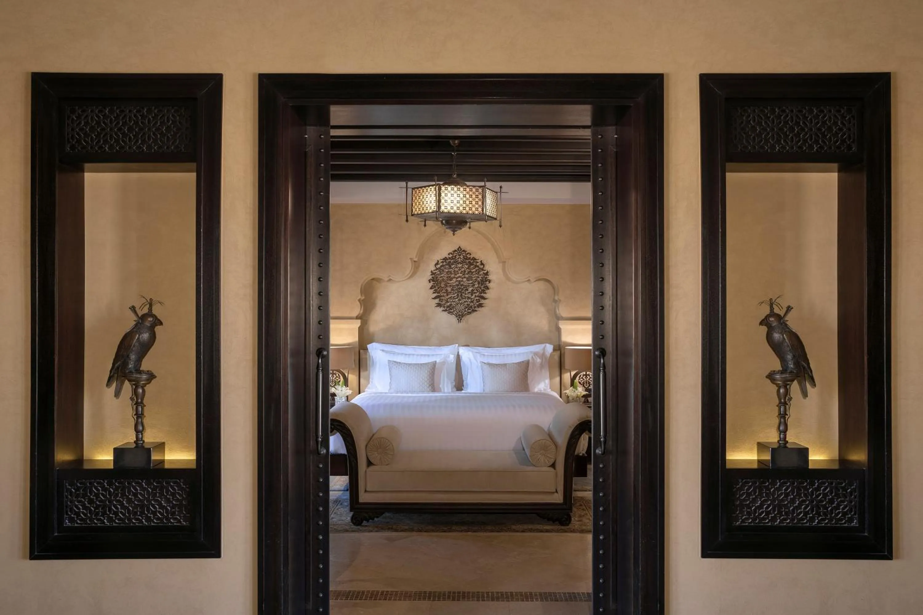 Bed in Anantara Qasr al Sarab Desert Resort