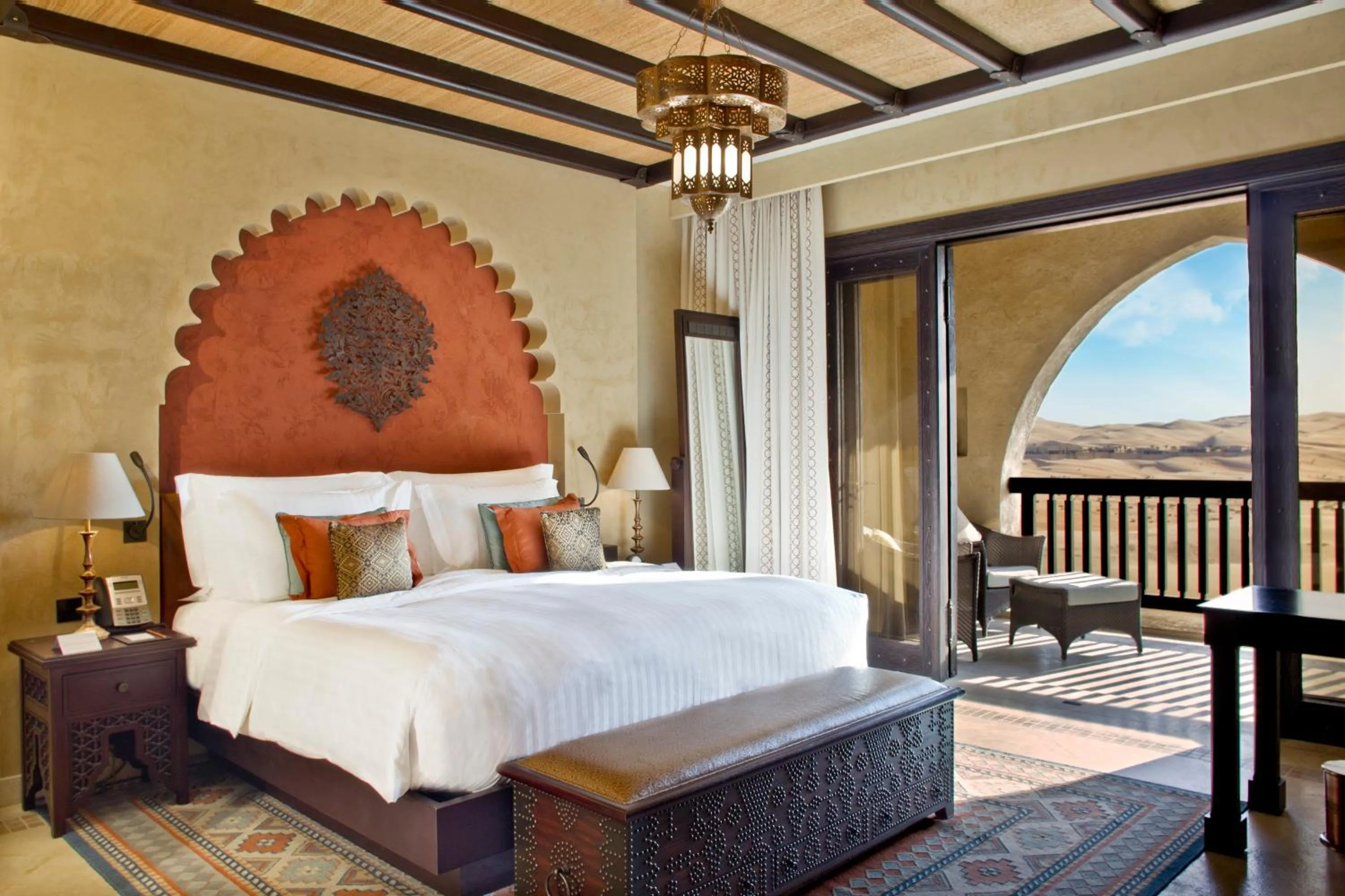 Bed in Anantara Qasr al Sarab Desert Resort