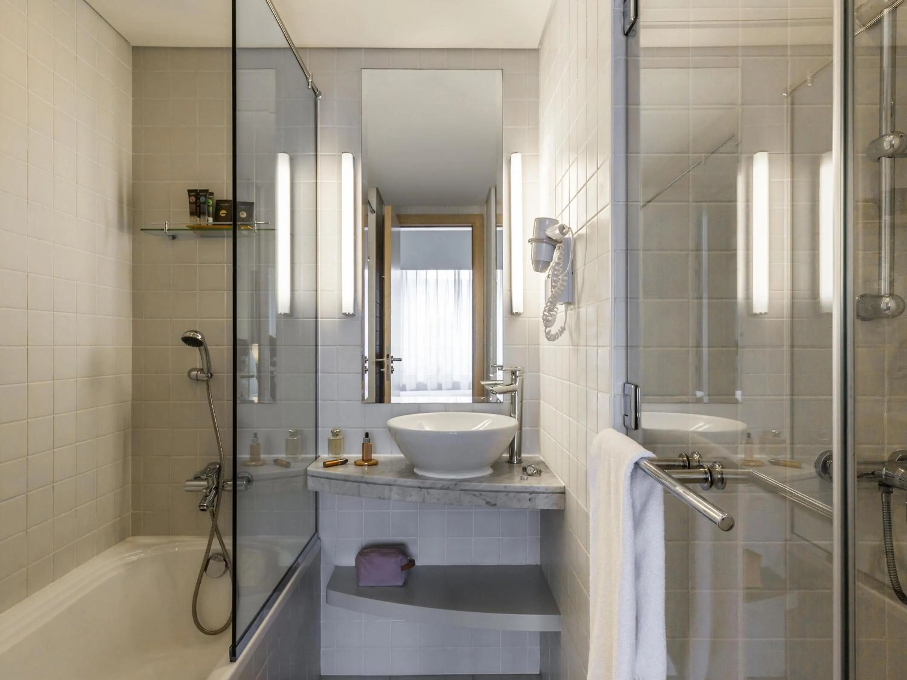 Bedroom in Novotel Suites Mall Avenue Dubai