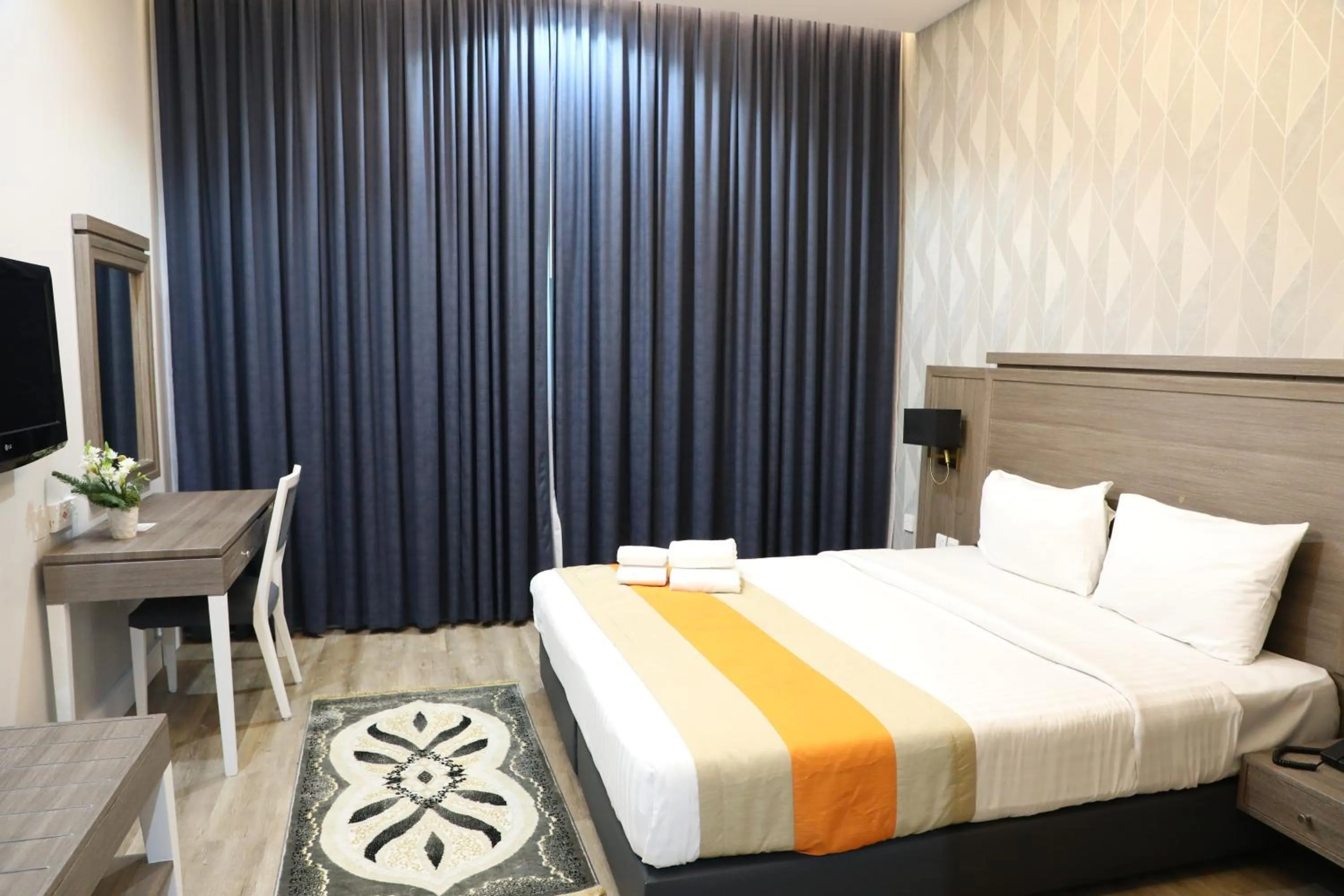 Bed in Wescott Plaza Hotel Apartments LLC Formerly West Zone Plaza Hotel Apts