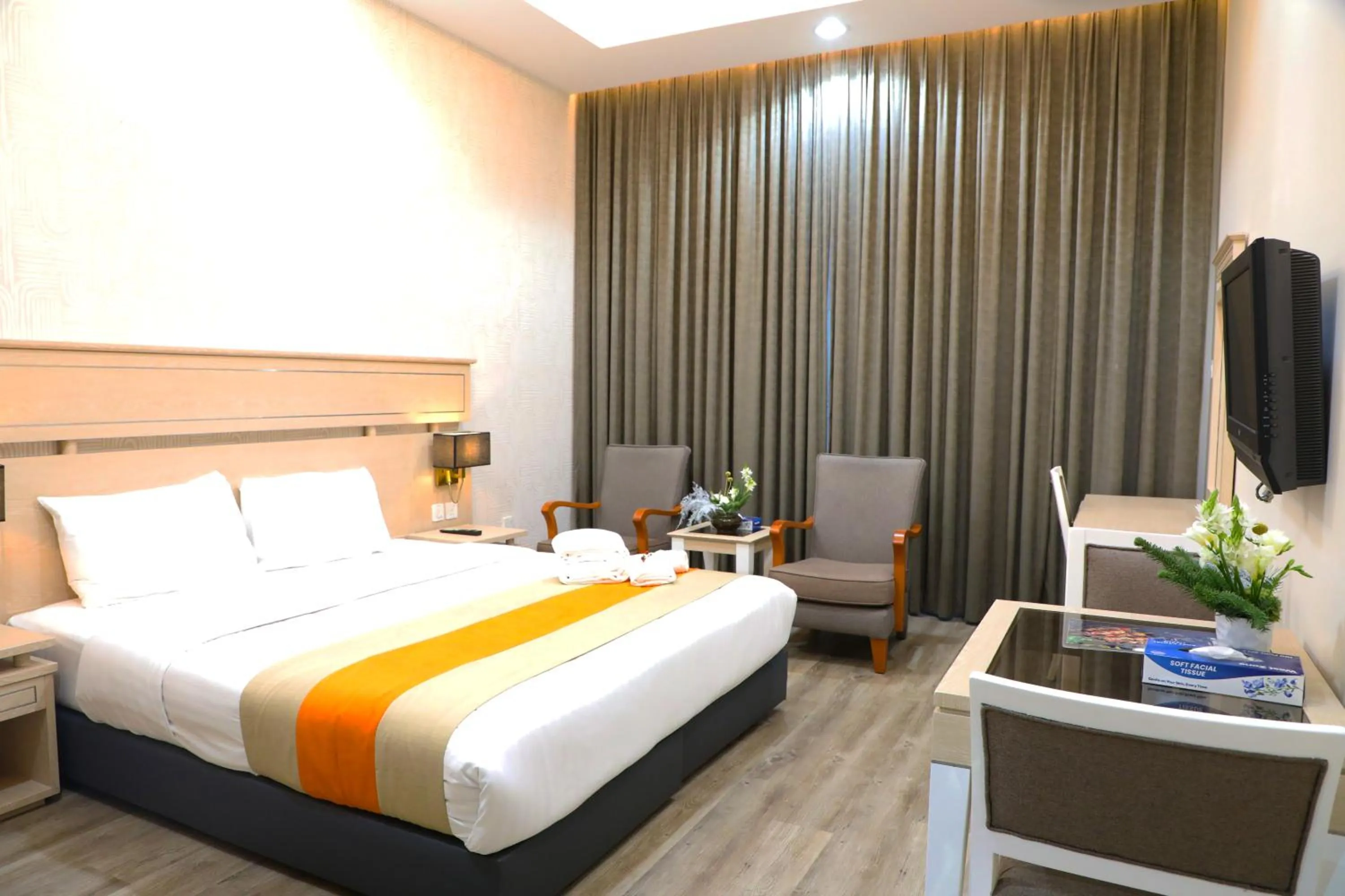 Bed in Wescott Plaza Hotel Apartments LLC Formerly West Zone Plaza Hotel Apts