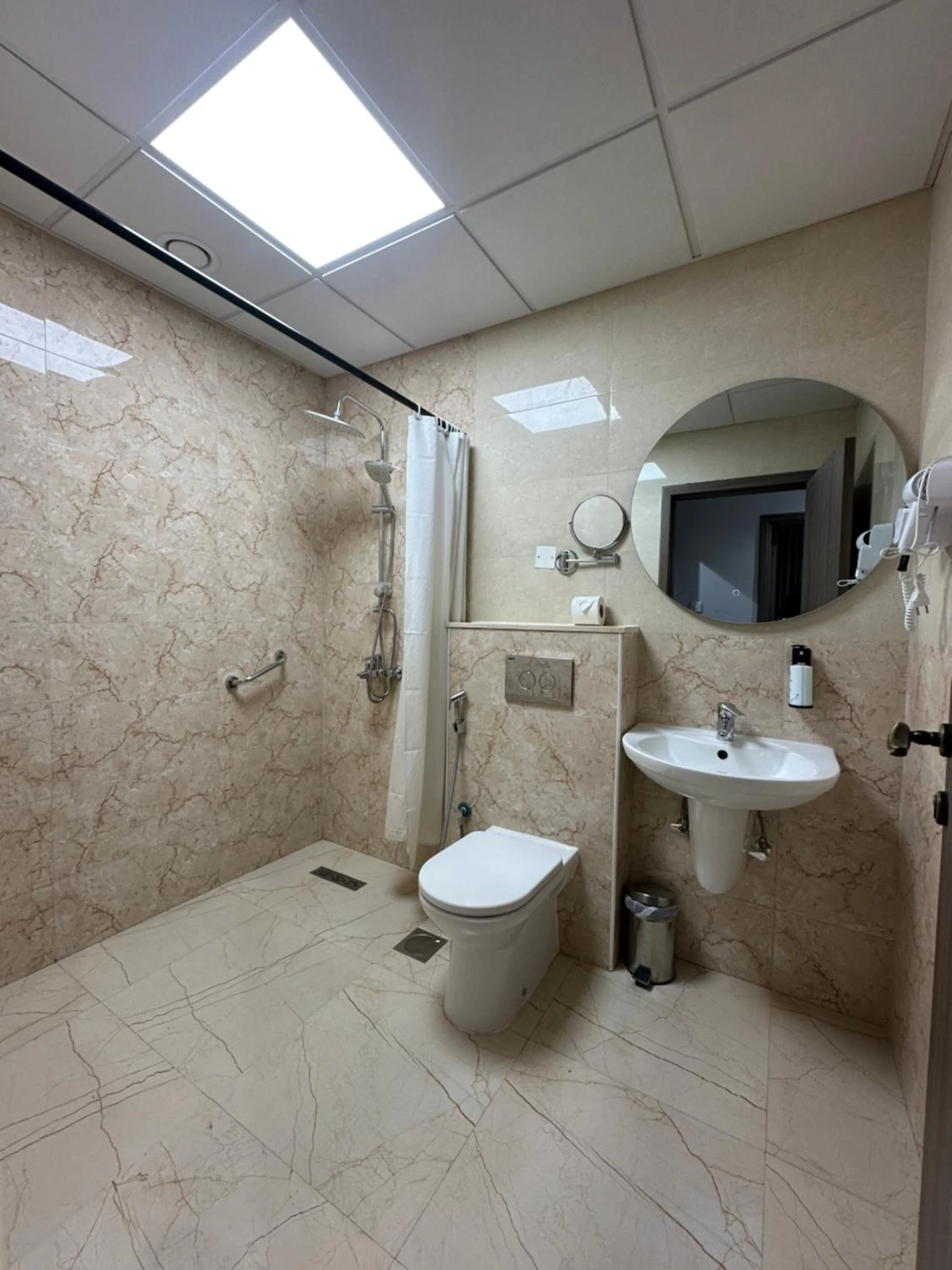 Shower in Wescott Plaza Hotel Apartments LLC Formerly West Zone Plaza Hotel Apts