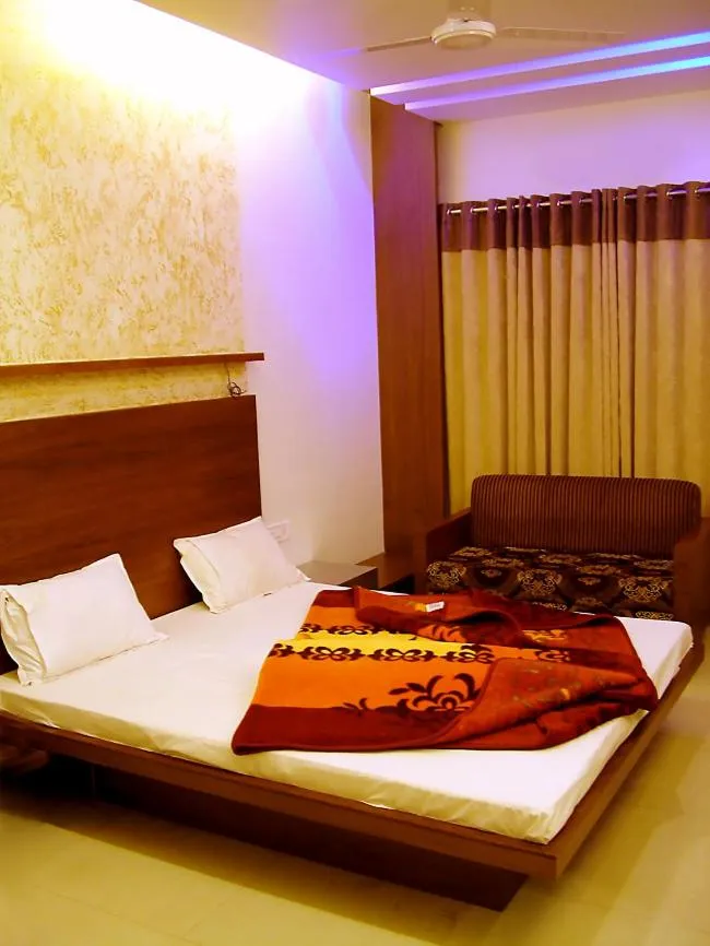 Bed in Hotel Rajmandir