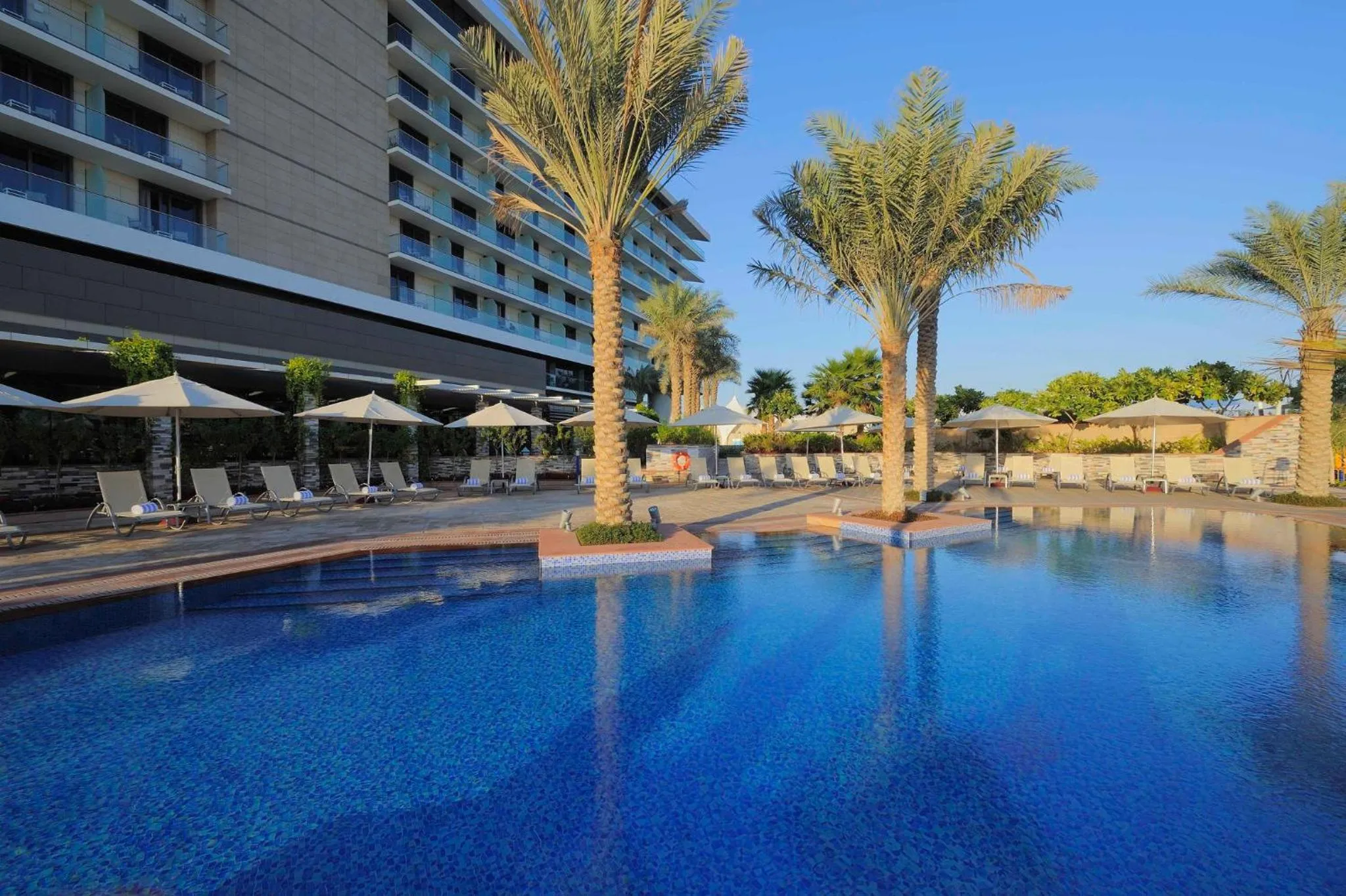 Swimming pool in Yas Plaza Bay by IHG
