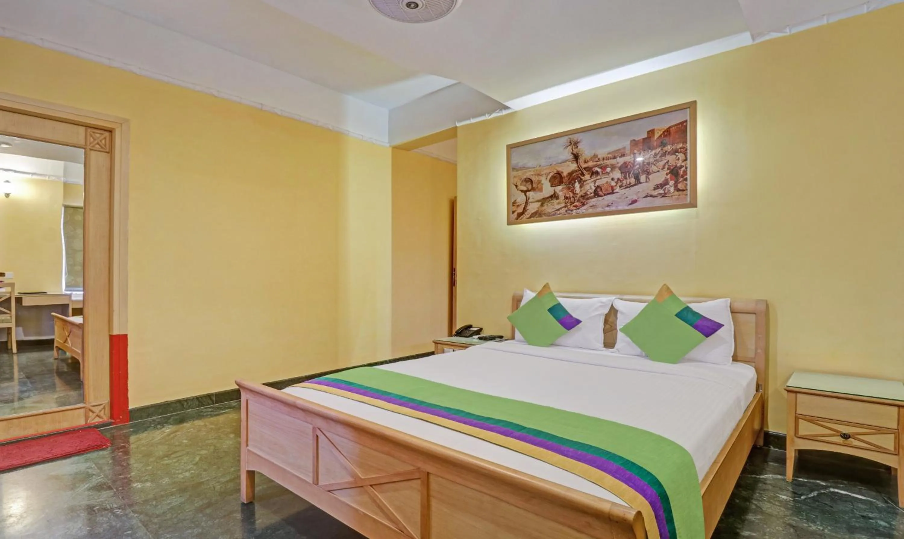Bedroom, Bed in Treebo Komfort Suites, 3 Km From Mysore Palace