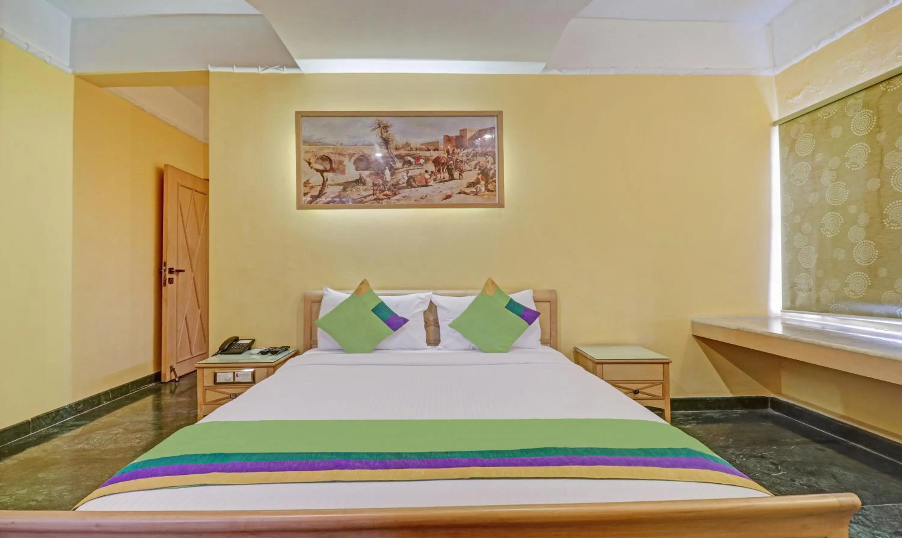 Bedroom, Bed in Treebo Komfort Suites, 3 Km From Mysore Palace