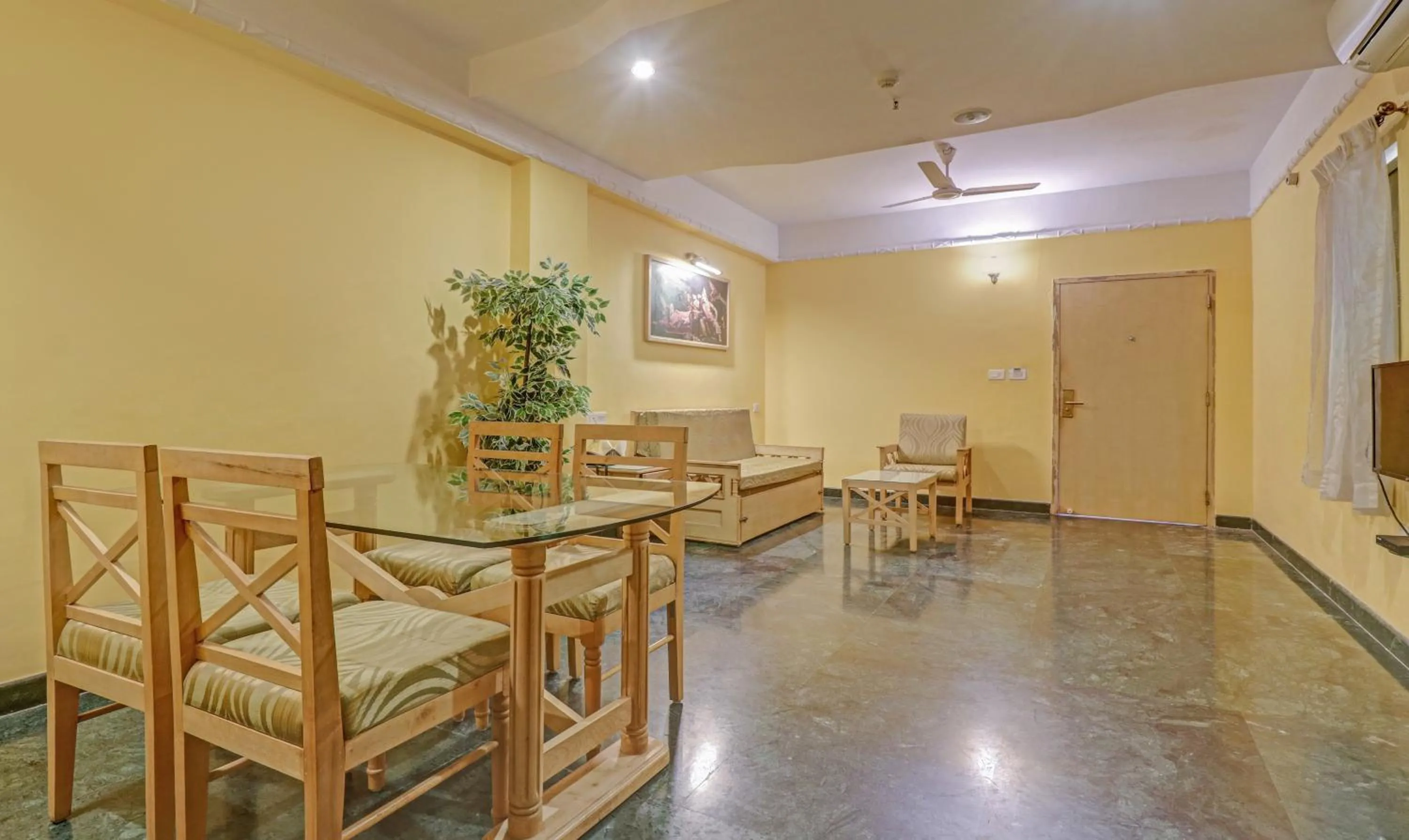 Seating area in Treebo Komfort Suites, 3 Km From Mysore Palace