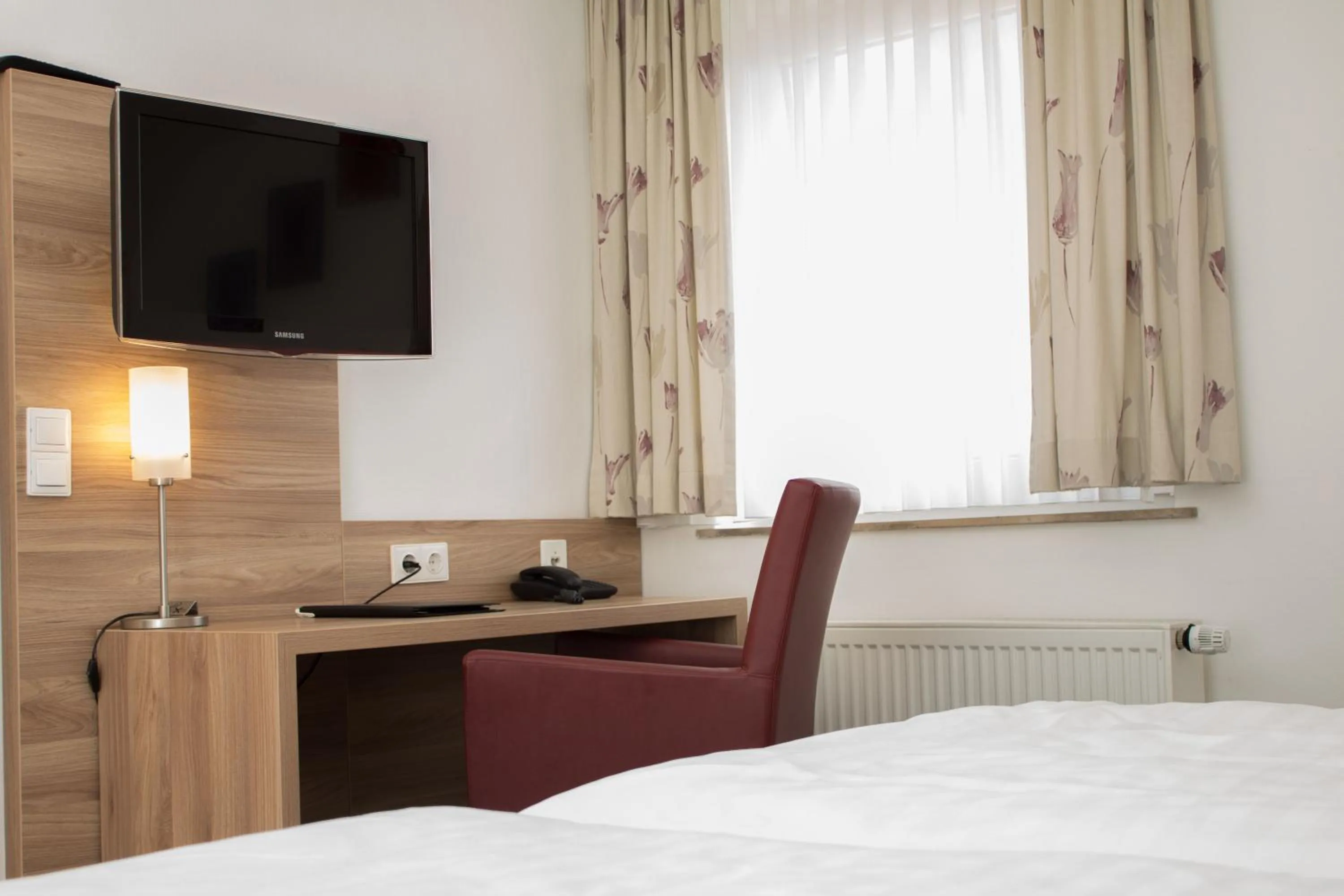 Photo of the whole room, Bed in Hotel Schützenburg