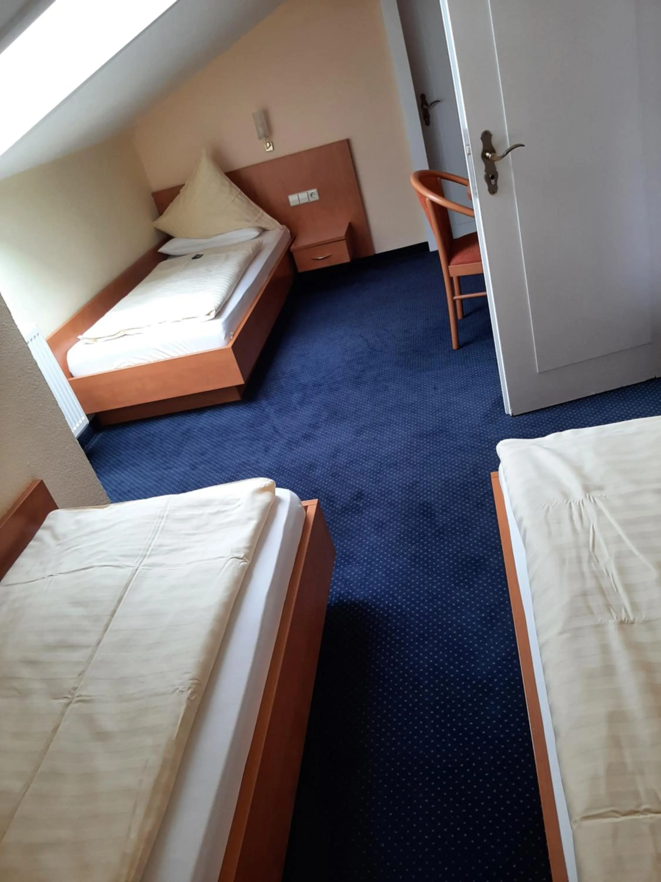 Photo of the whole room, Bed in BSW Schwarzwaldhotel Baiersbronn