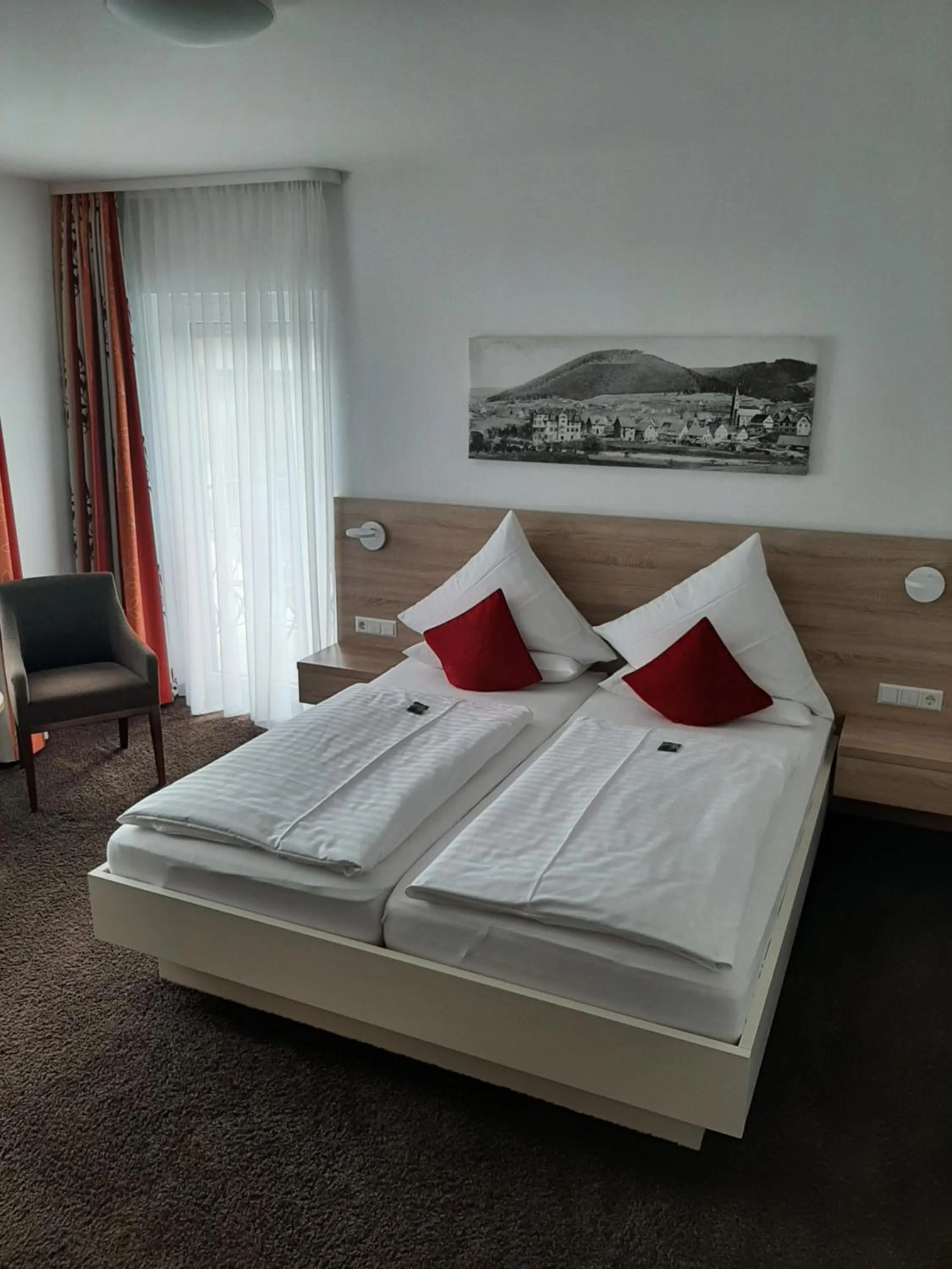 Photo of the whole room, Bed in BSW Schwarzwaldhotel Baiersbronn