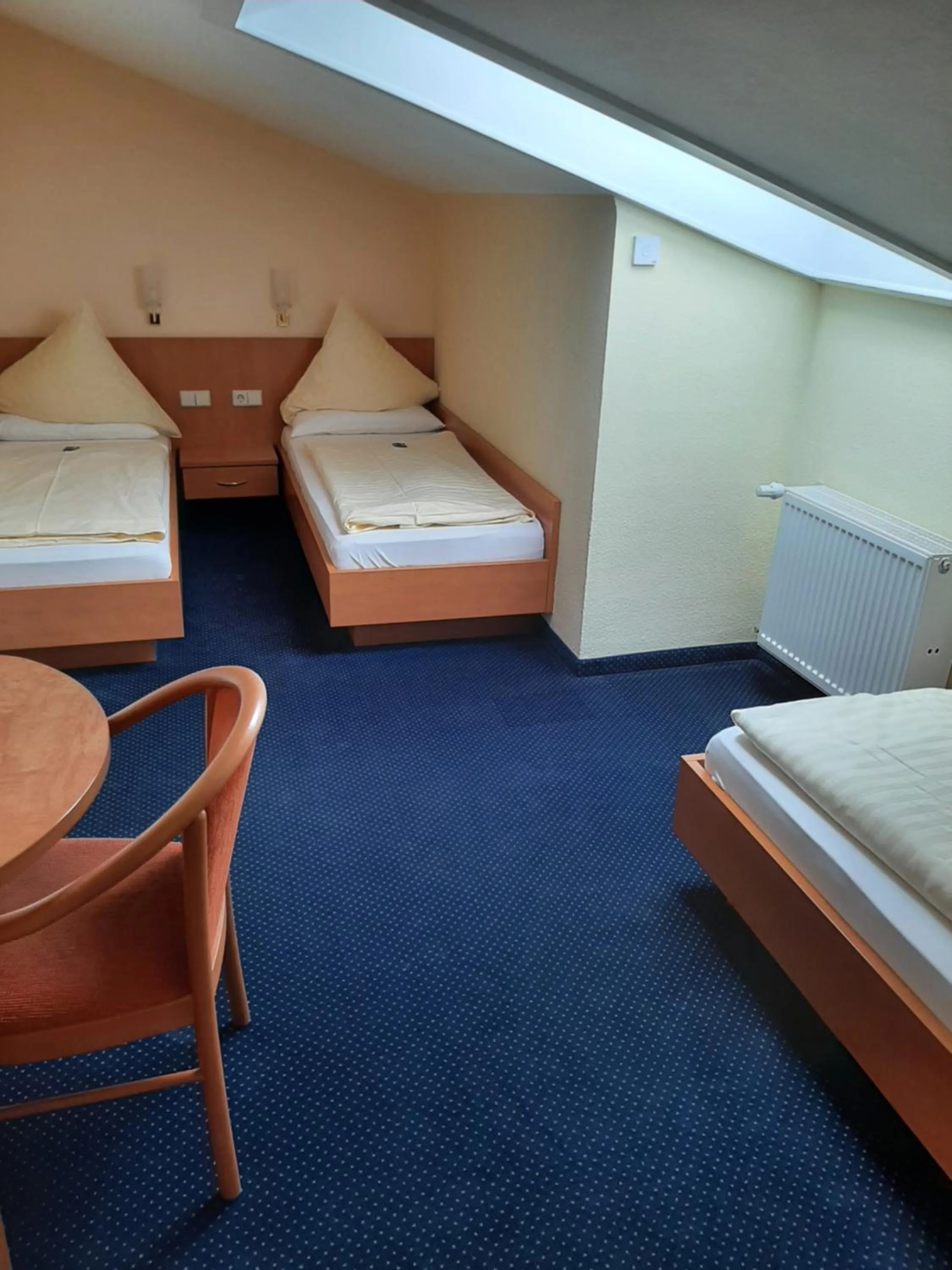 Photo of the whole room, Bed in BSW Schwarzwaldhotel Baiersbronn