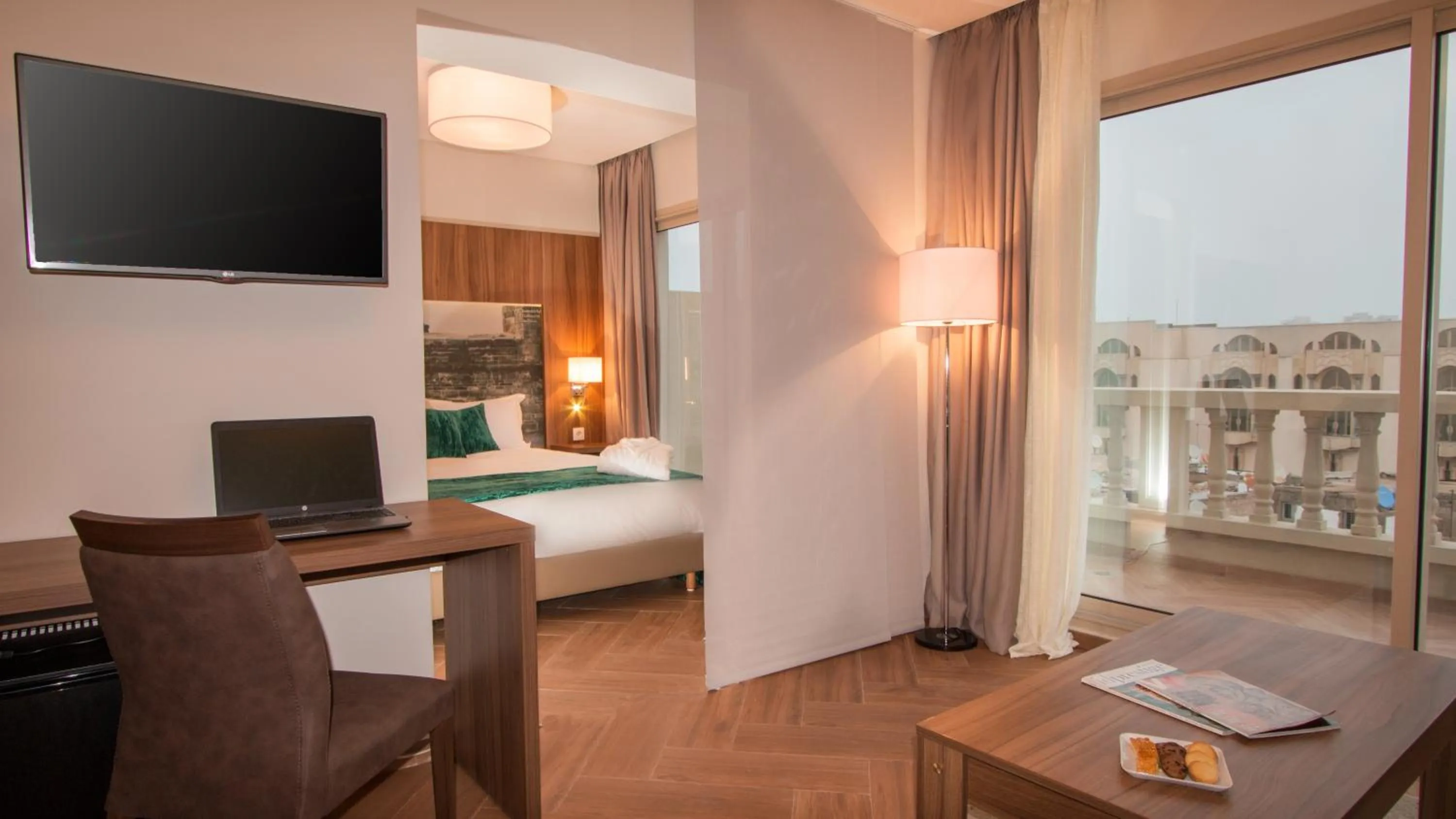 Living room, Bed in Melliber Appart Hotel