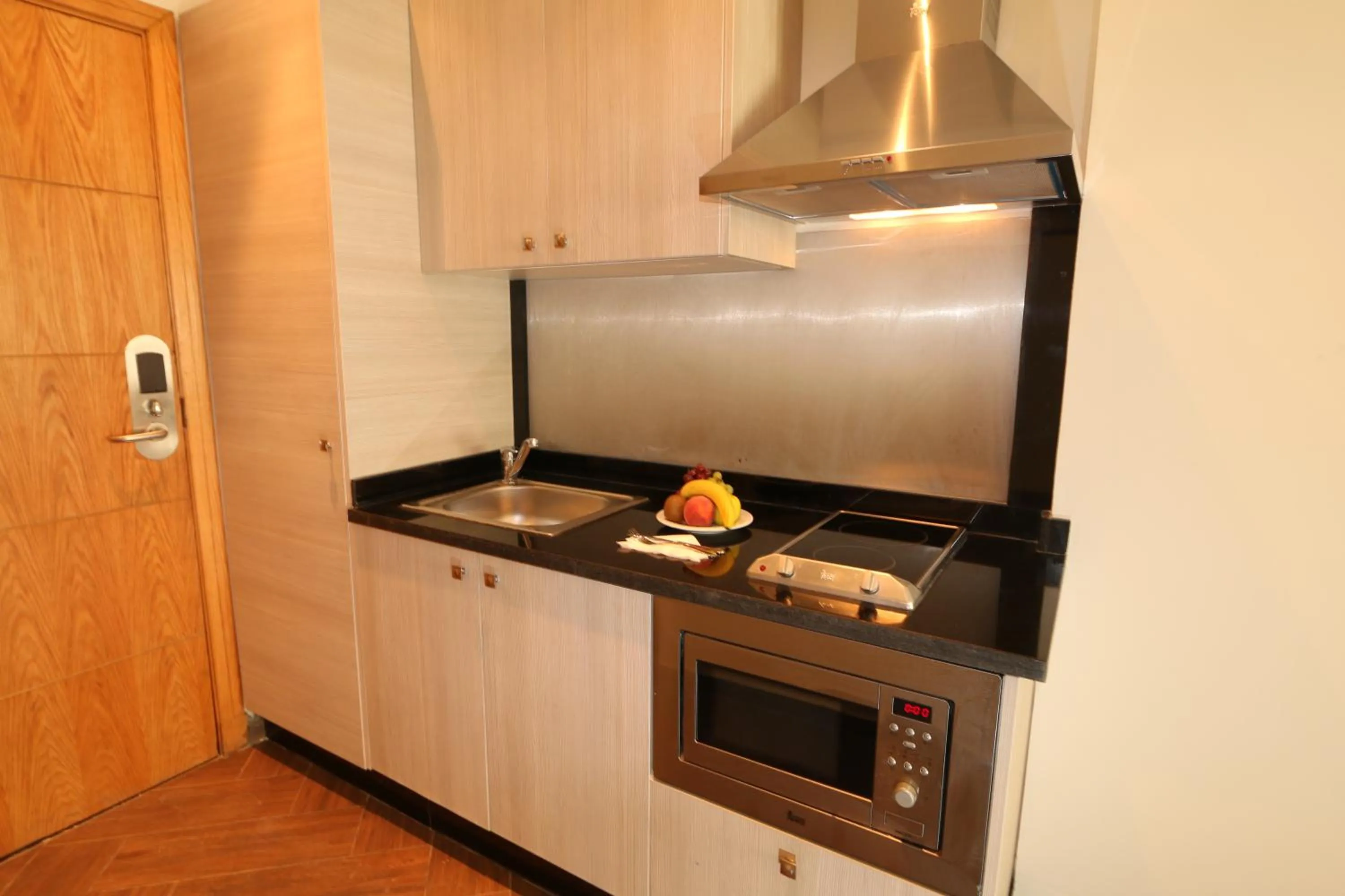 Kitchen or kitchenette in Melliber Appart Hotel