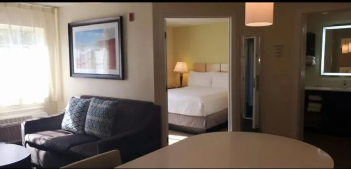 Toilet, Bed in Candlewood Suites Houston Medical Center by IHG