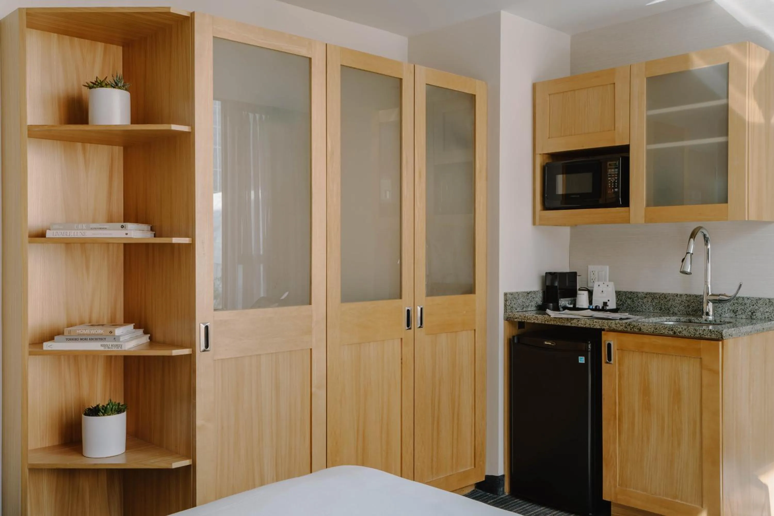 Kitchen or kitchenette in World Center Hotel