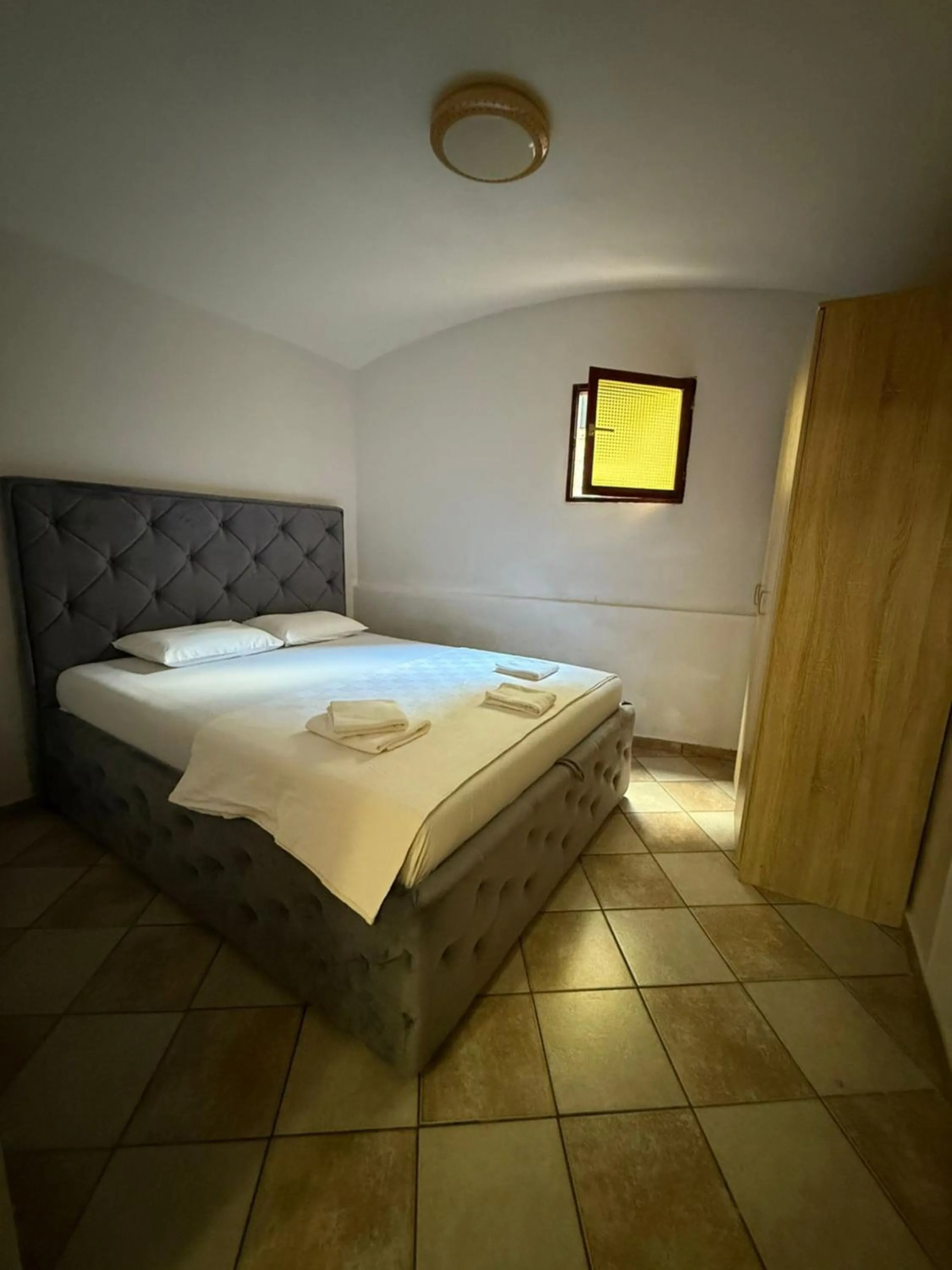 Bed in Athos Guesthouse