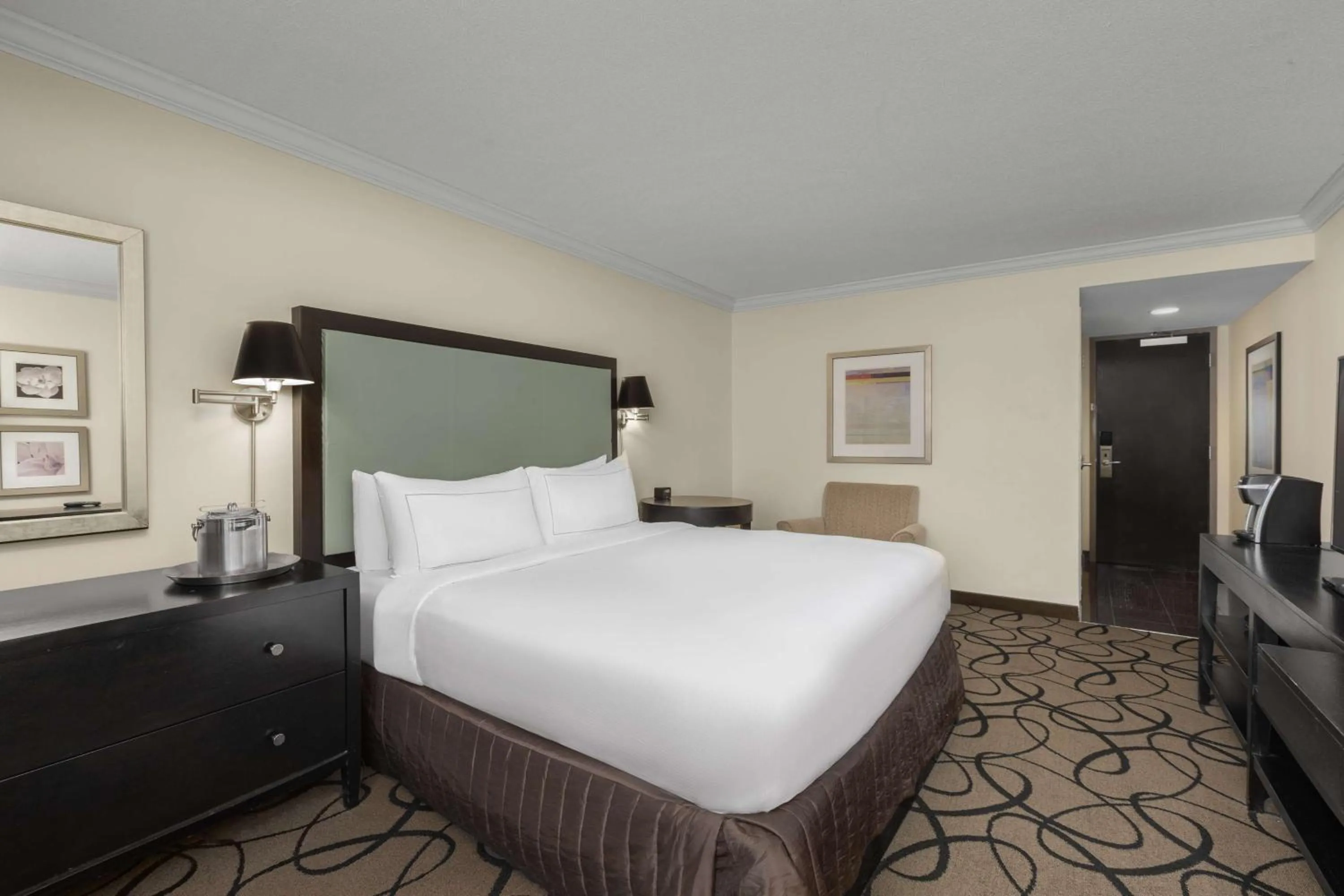 Bed in The Verve Boston Natick, Tapestry Collection by Hilton