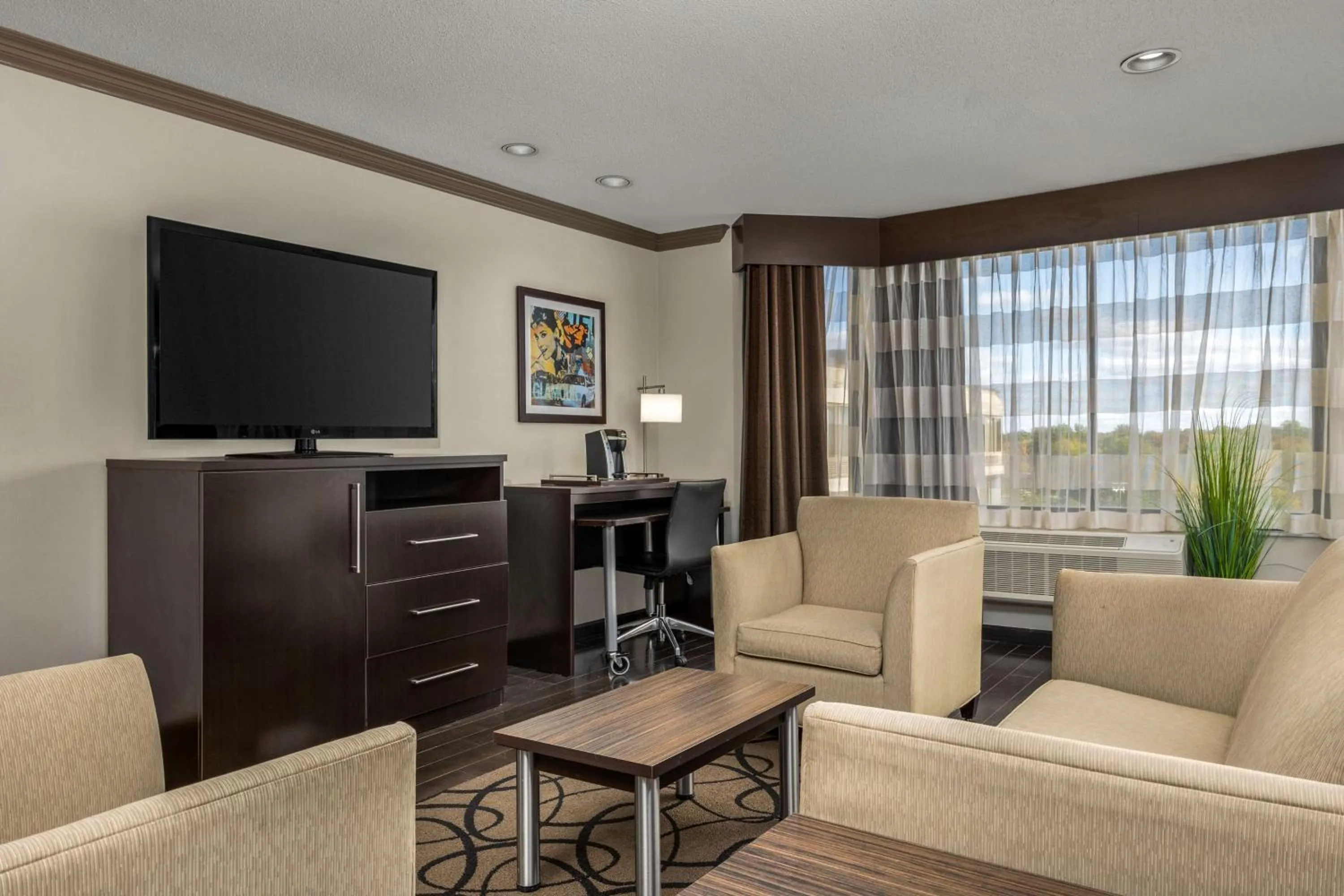 Living room in The Verve Boston Natick, Tapestry Collection by Hilton