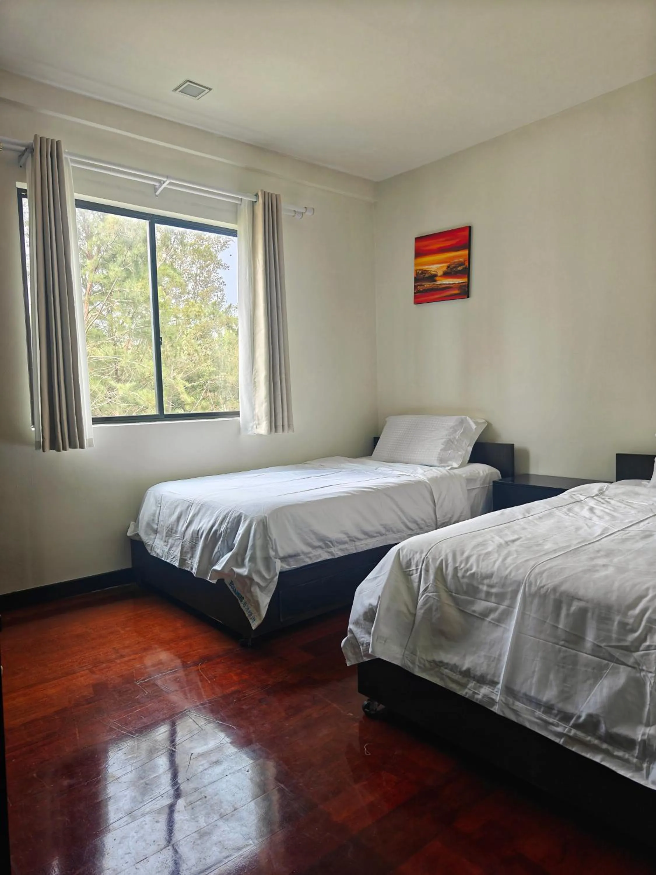 Bed in Sabah Beach Villas & Suites